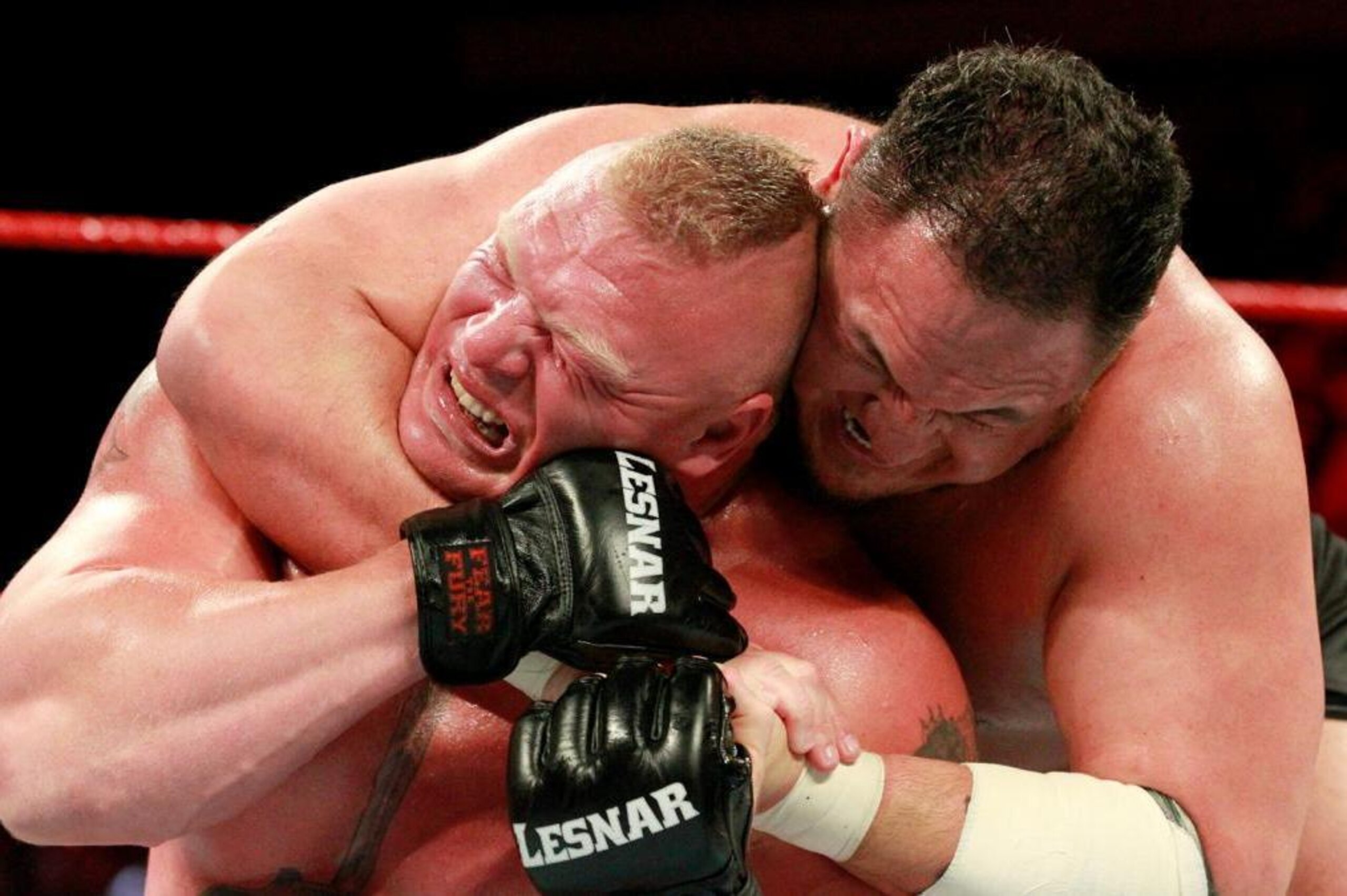 Samoa Joe looks to finish off Brock Lesnar.