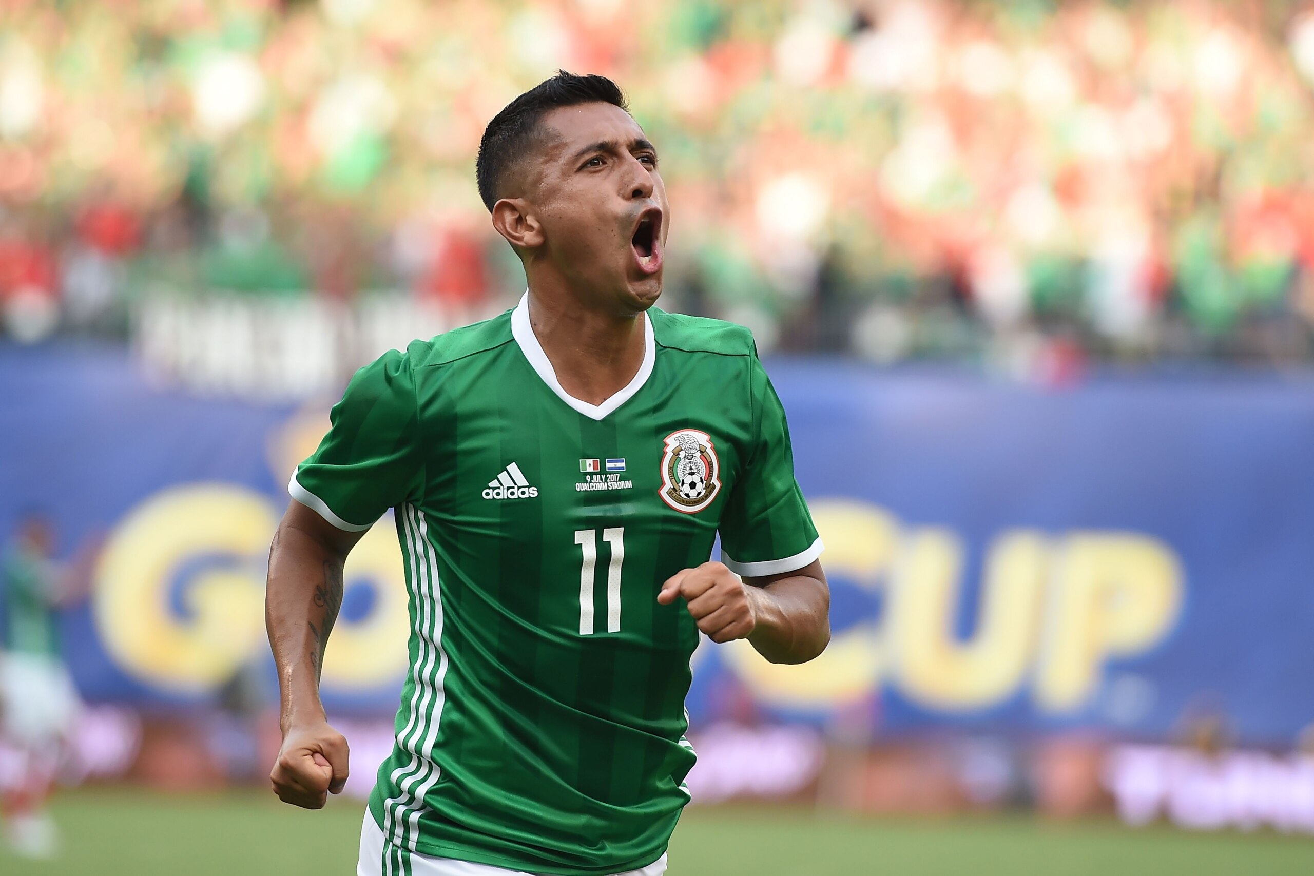 Mexico's Elias Hernandez (11) celebrates his goal against El Salvador in Group C play in the 2017 CONCACAF Gold Cup, July 9, 2017 at Qualcomm Stadium in San Diego, California. / AFP PHOTO / Robyn Beck        (Photo credit should read ROBYN BECK/AFP/Getty 