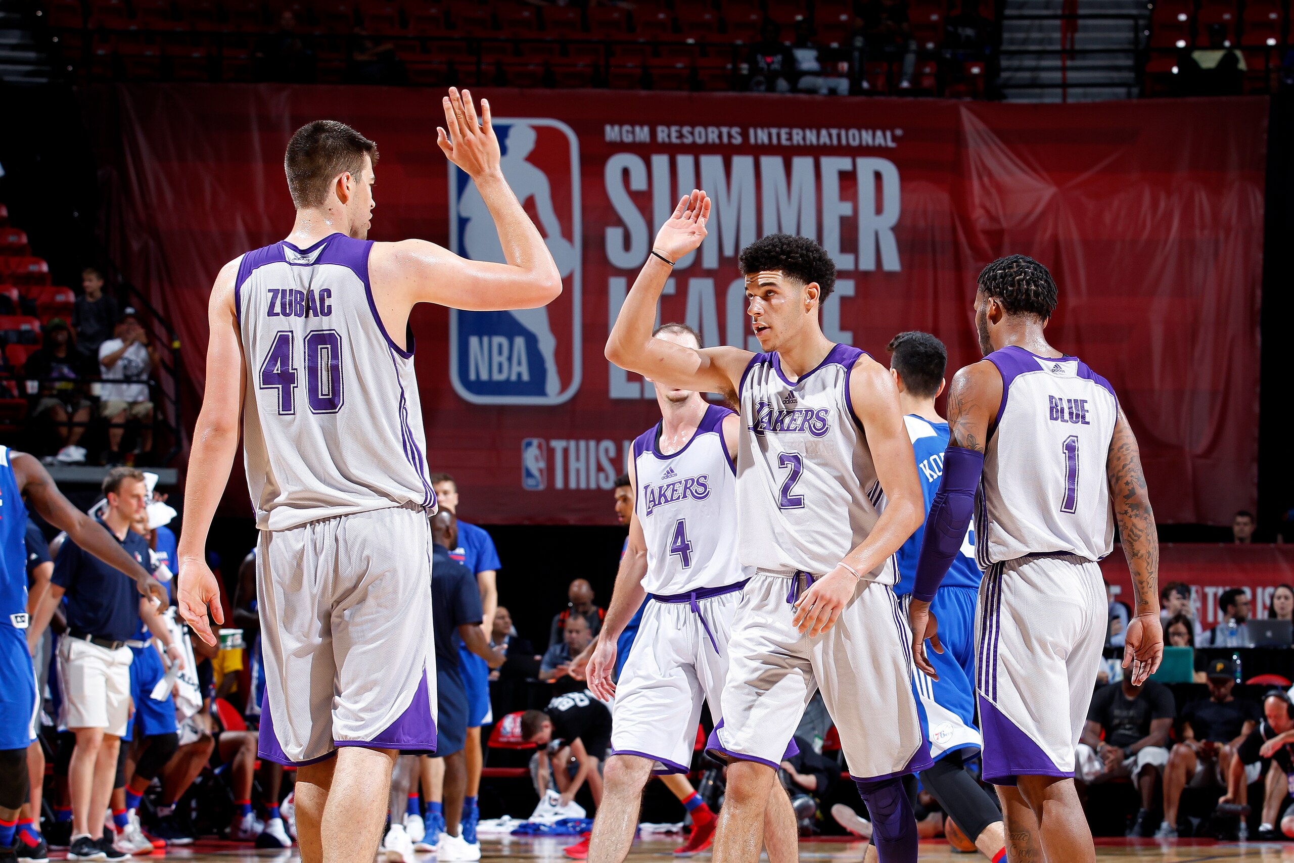 LAS VEGAS, NV - JULY 12: Ivica Zubac #40 and Lonzo Ball #2 of the Los Angeles Lakers high five each other during the game against the Philadelphia 76ers during the 2017 Las Vegas Summer League on July 12, 2017 at the Thomas & Mack Center in Las Vegas, Nev