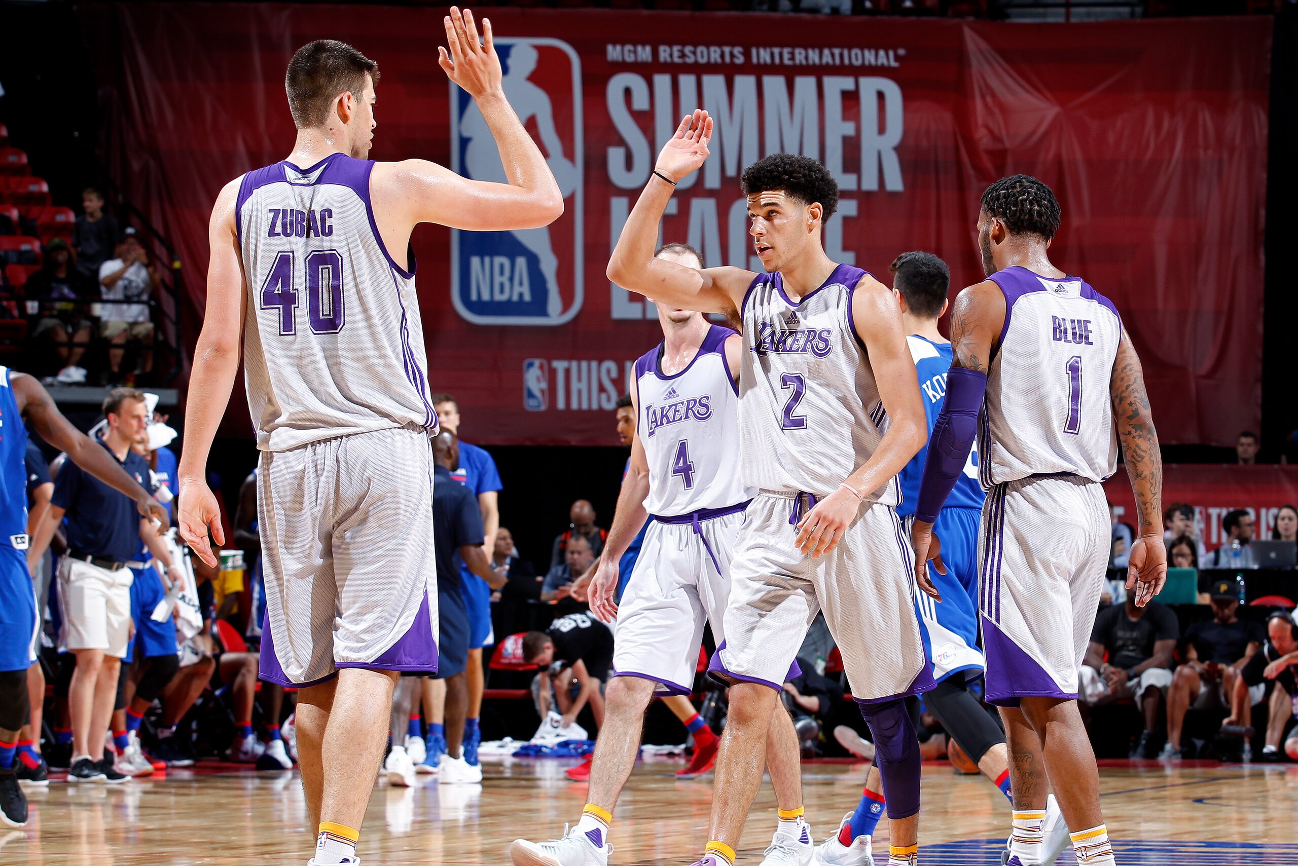 LAS VEGAS, NV - JULY 12: Ivica Zubac #40 and Lonzo Ball #2 of the Los Angeles Lakers high five each other during the game against the Philadelphia 76ers during the 2017 Las Vegas Summer League on July 12, 2017 at the Thomas & Mack Center in Las Vegas, Nev