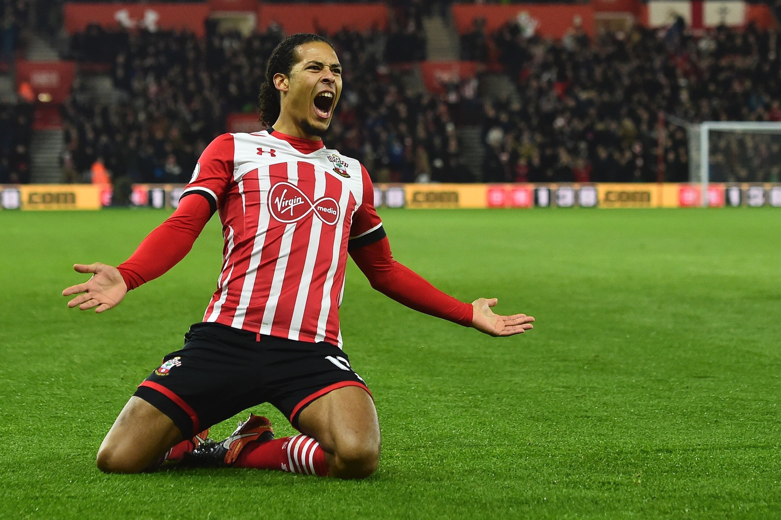 Southampton's Dutch defender Virgil van Dijk celebrates scoring the opening goal during the English Premier League football match between Southampton and Tottenham Hotspur at St Mary's Stadium in Southampton, southern England on December 28, 2016. / AFP /