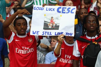 LONDON, ENGLAND - AUGUST 16:  Arsenal fans show their support for former captain Cesc Fabregas ahead of the UEFA Champions League play-off first leg match between Arsenal and Udinese at the Emirates Stadium on August 16, 2011 in London, England.  (Photo b