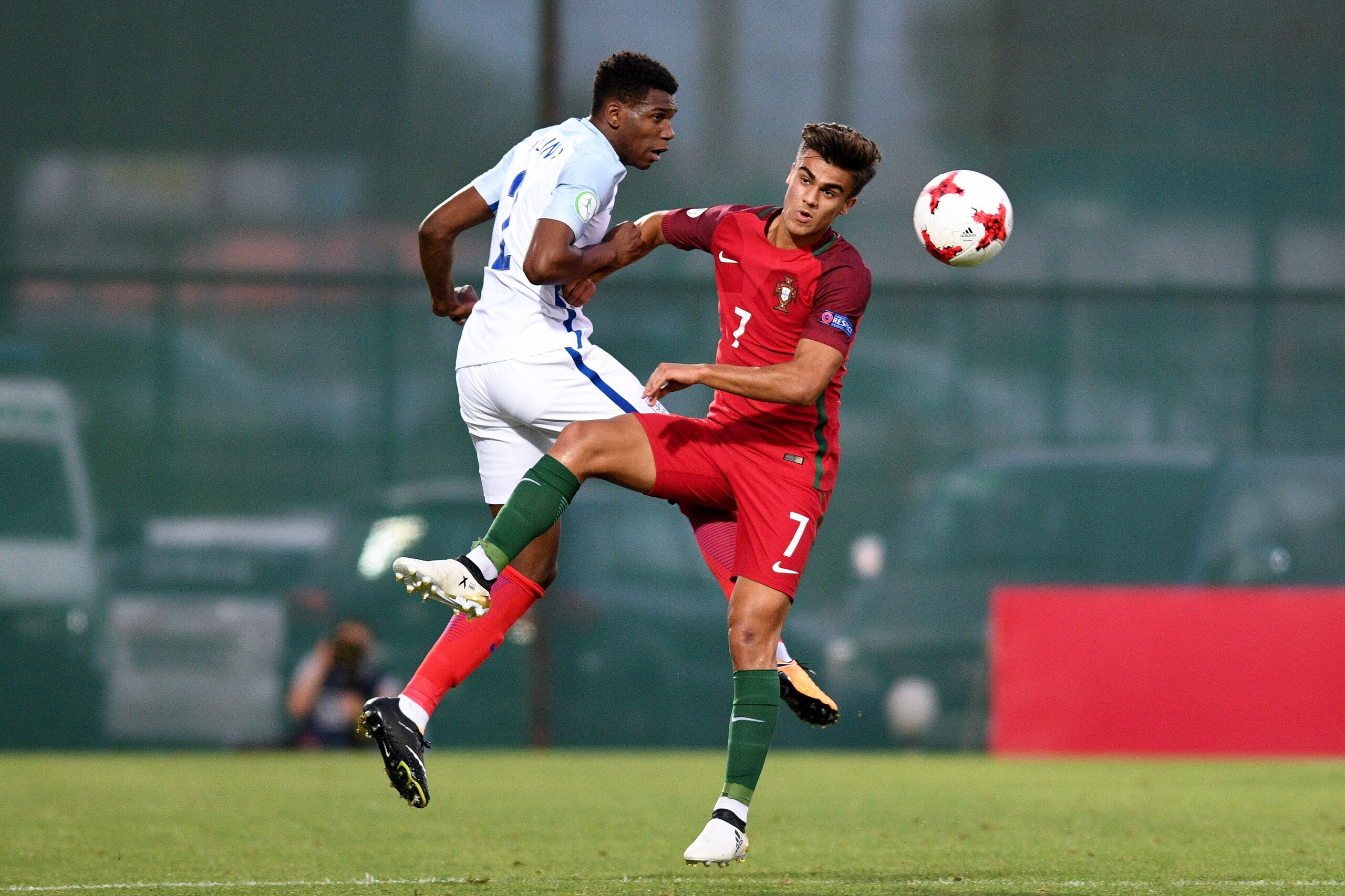 TBILISI, GEORGIA - JULY 15: Dujon Sterling of England and Joao Filipe of Portugal battle for the ball during the UEFA European Under-19 Championship Final between England and Portugal on July 15, 2017 in Gori, Georgia. (Photo by Levan Verdzeuli/Getty Ima TBILISI, GEORGIA - JULY 15: Dujon Sterling of England and Joao Filipe of Portugal battle for the ball during the UEFA European Under-19 Championship Final between England and Portugal on July 15, 2017 in Gori, Georgia. (Photo by Levan Verdzeuli/Getty Ima