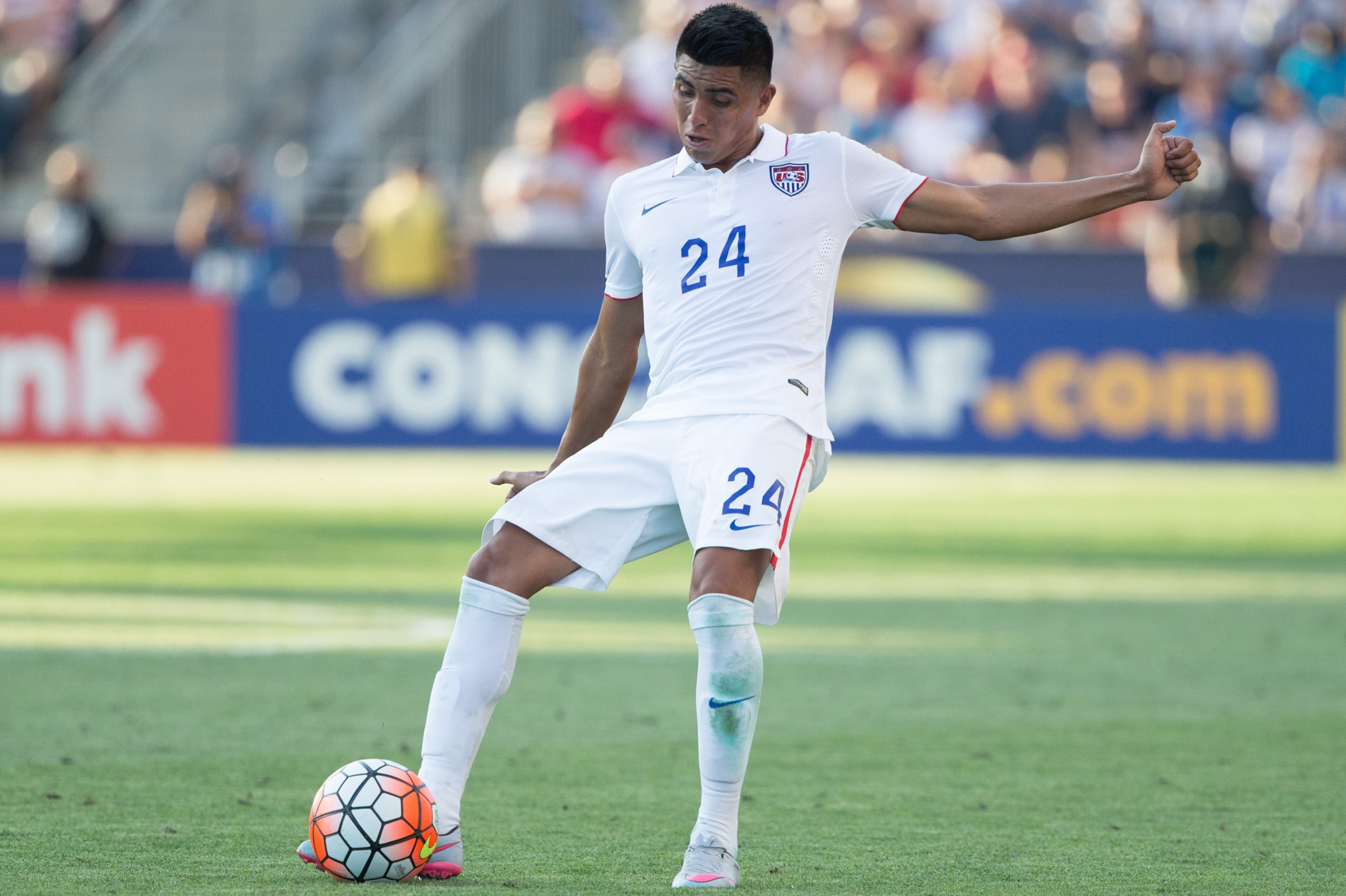 Jul 25, 2015; Chester, PA, USA; the United States midfielder Joe Corona (24) kicks the ball against Panama during the CONCACAF Gold Cup third place match at PPL Park. Panama wins on penalty kicks after a 1-1 draw. Mandatory Credit: Bill Streicher-USA TODA