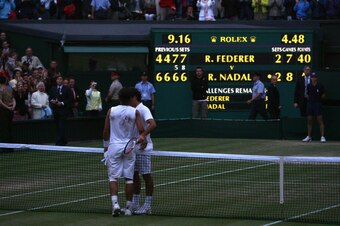 LONDON - JULY 06:  Rafael Nadal of Spain shakes hands with Roger Federer of Switzerland after Nadal won in five sets in the final on day thirteen of the Wimbledon Lawn Tennis Championships at the All England Lawn Tennis and Croquet Club on July 6, 2008 in