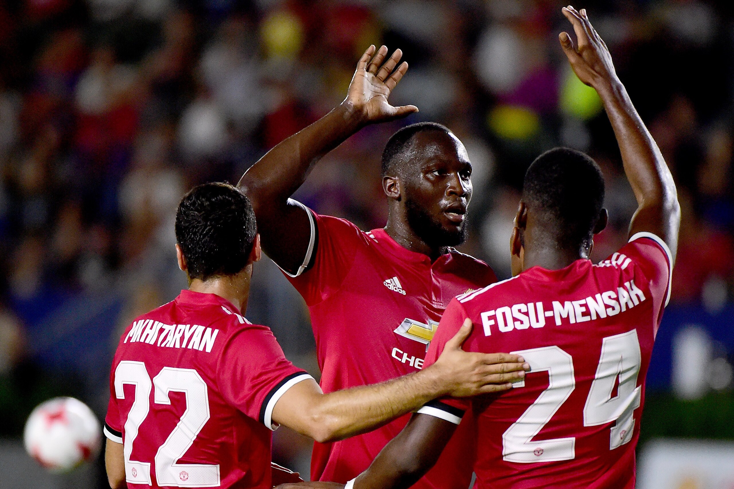 CARSON, CA - JULY 15: Romelo Lukaku #9 of Manchester United celebrates a goal from Anthony Martial #11 with Timothy Fosu-Mensah #24 and Henrikh Mkhitaryan #22 to take a 5-0 lead during the second half at StubHub Center on July 15, 2017 in Carson, Califor CARSON, CA - JULY 15: Romelo Lukaku #9 of Manchester United celebrates a goal from Anthony Martial #11 with Timothy Fosu-Mensah #24 and Henrikh Mkhitaryan #22 to take a 5-0 lead during the second half at StubHub Center on July 15, 2017 in Carson, Califor