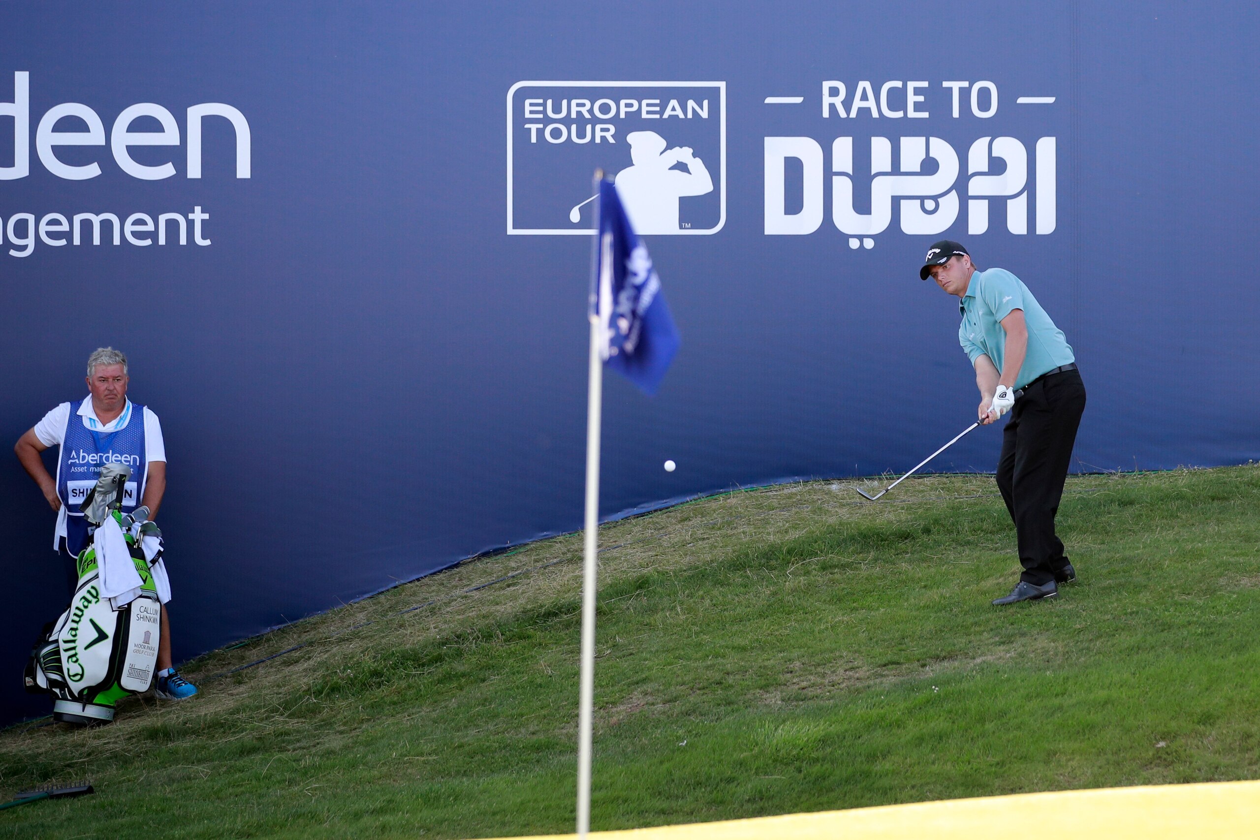 TROON, SCOTLAND - JULY 16:  Callum Shinkwin of England chips to the 18th green during the final round of the AAM Scottish Open at Dundonald Links Golf Course on July 16, 2017 in Troon, Scotland.  (Photo by Gregory Shamus/Getty Images)