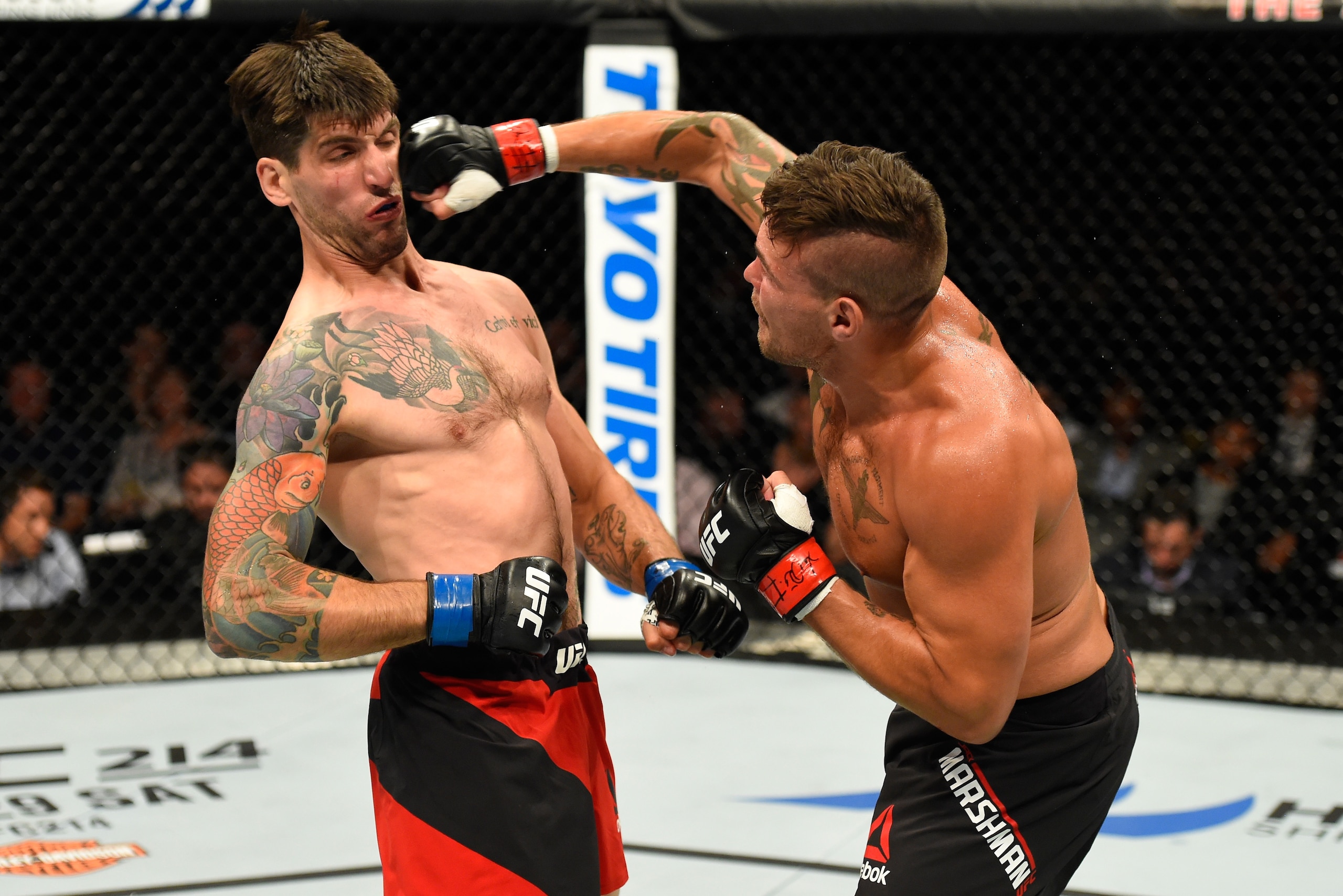 GLASGOW, SCOTLAND - JULY 16:  (R-L) Jack Marshman of Wales punches Ryan Janes of Canada in their middleweight bout during the UFC Fight Night event at the SSE Hydro Arena Glasgow on July 16, 2017 in Glasgow, Scotland. (Photo by Josh Hedges/Zuffa LLC/Zuffa