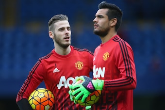 LONDON, ENGLAND - FEBRUARY 07:  David De Gea of Manchester United talks to Sergio Romero of Manchester United during the Barclays Premier League match between Chelsea and Manchester United at Stamford Bridge on February 7, 2016 in London, England.  (Photo