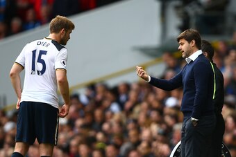 LONDON, ENGLAND - APRIL 15: Mauricio Pochettino, Manager of Tottenham Hotspur (R) speaks to Eric Dier of Tottenham Hotspur (L) during the Premier League match between Tottenham Hotspur and AFC Bournemouth at White Hart Lane on April 15, 2017 in London, En