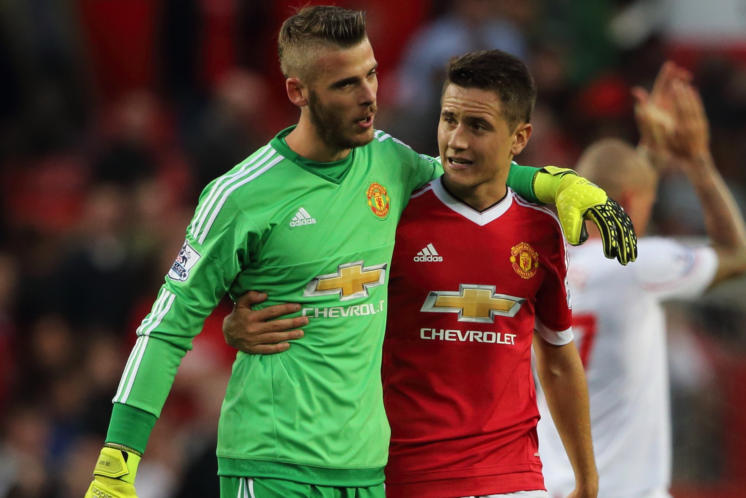 MANCHESTER, ENGLAND - SEPTEMBER 12:  David De Gea of Manchester United walks off with Ander Herrera of Manchester United after the 3-1 victory in the Barclays Premier League match between Manchester United and Liverpool on September 12, 2015 in Manchester