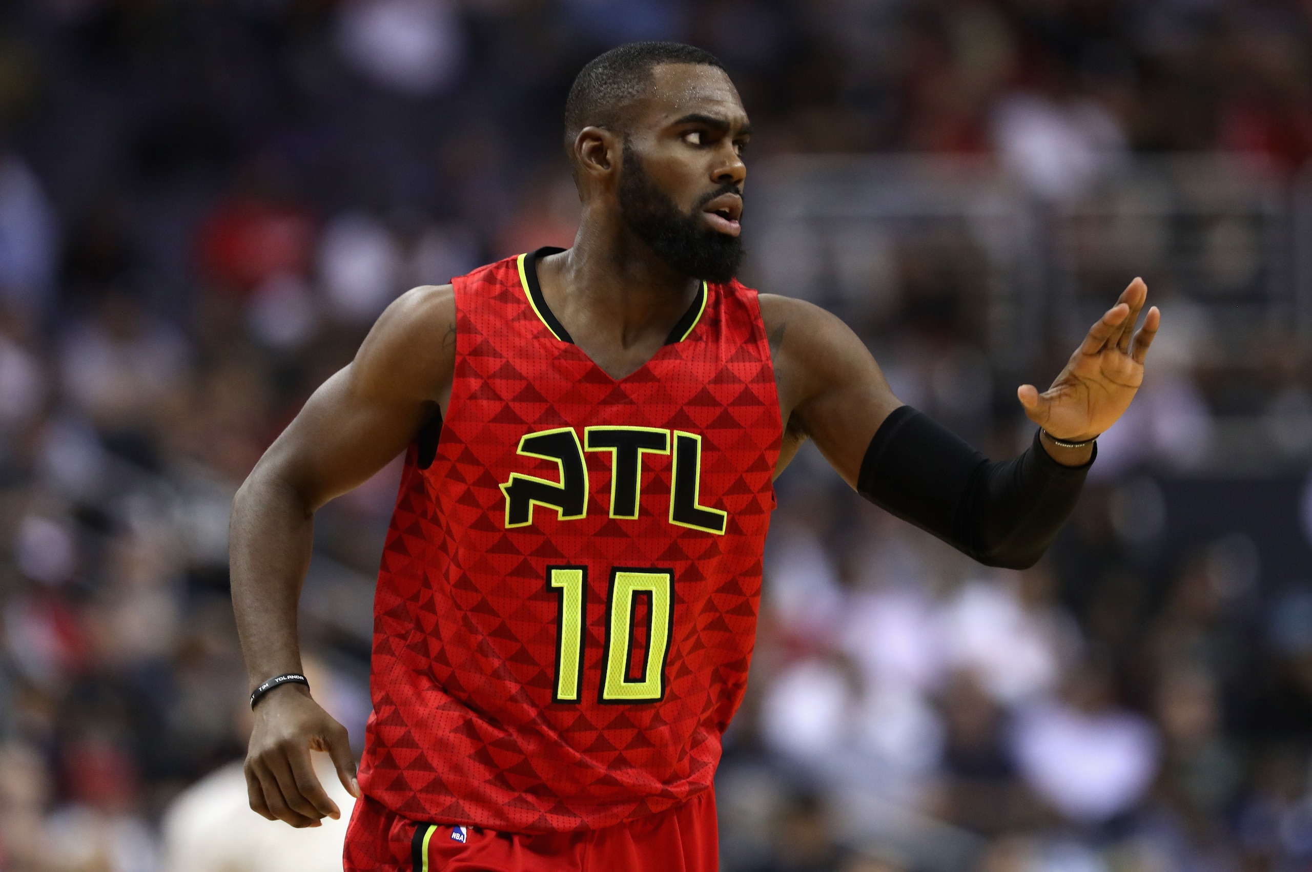 WASHINGTON, DC - APRIL 26: Tim Hardaway Jr. #10 of the Atlanta Hawks celebrates after scoring against the Washington Wizards in the first half of Game Five of the Eastern Conference Quarterfinals during the 2017 NBA Playoffs at at Verizon Center on April 