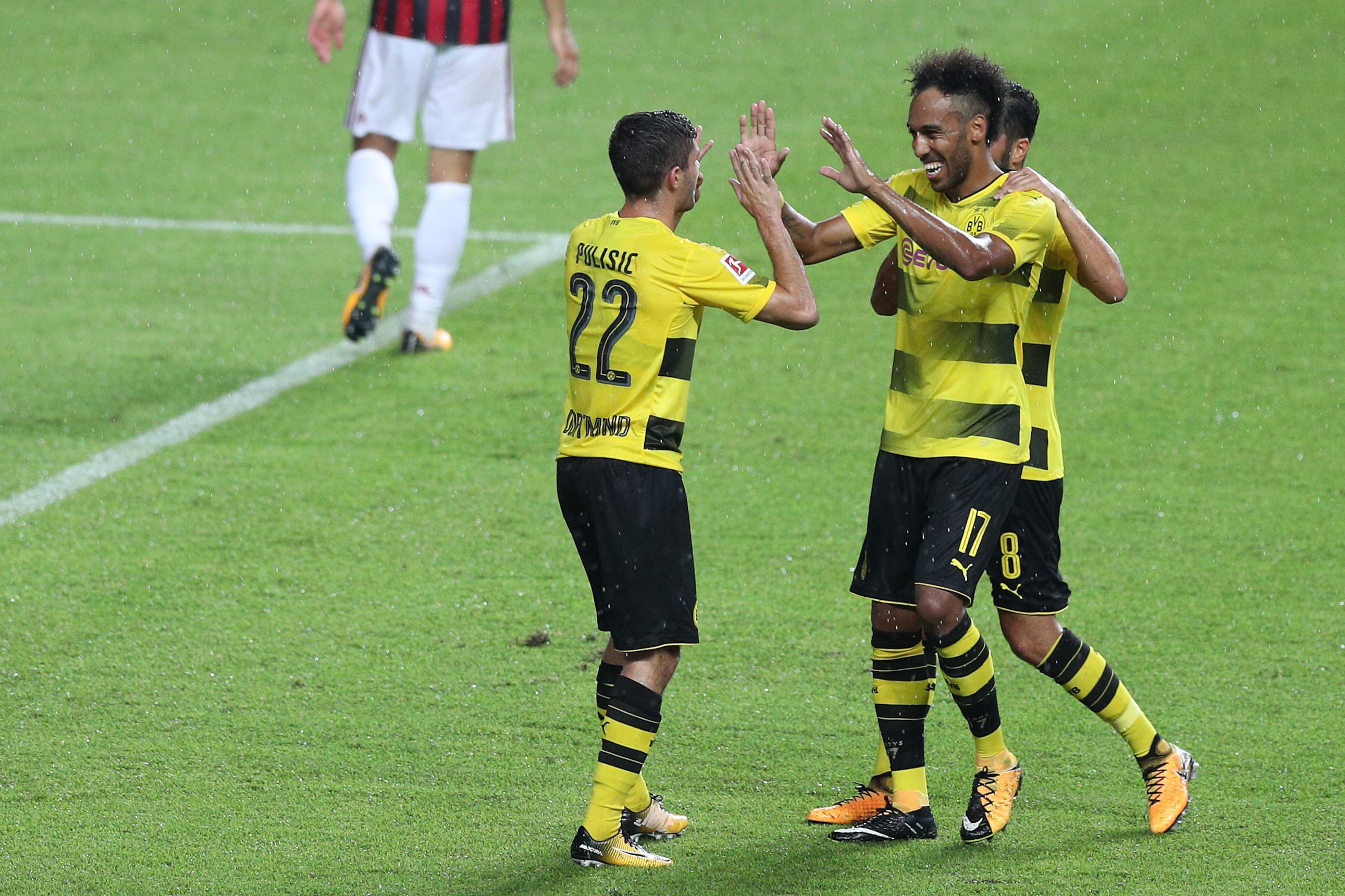 GUANGZHOU, CHINA - JULY 18:  #17 Pierre-Emerick Aubameyang(R-2) of Dortmund celebrates his goal with teammates during the 2017 International Champions Cup football match between AC Milan and Borussia Dortmund at University Town Sports Centre Stadium on Ju