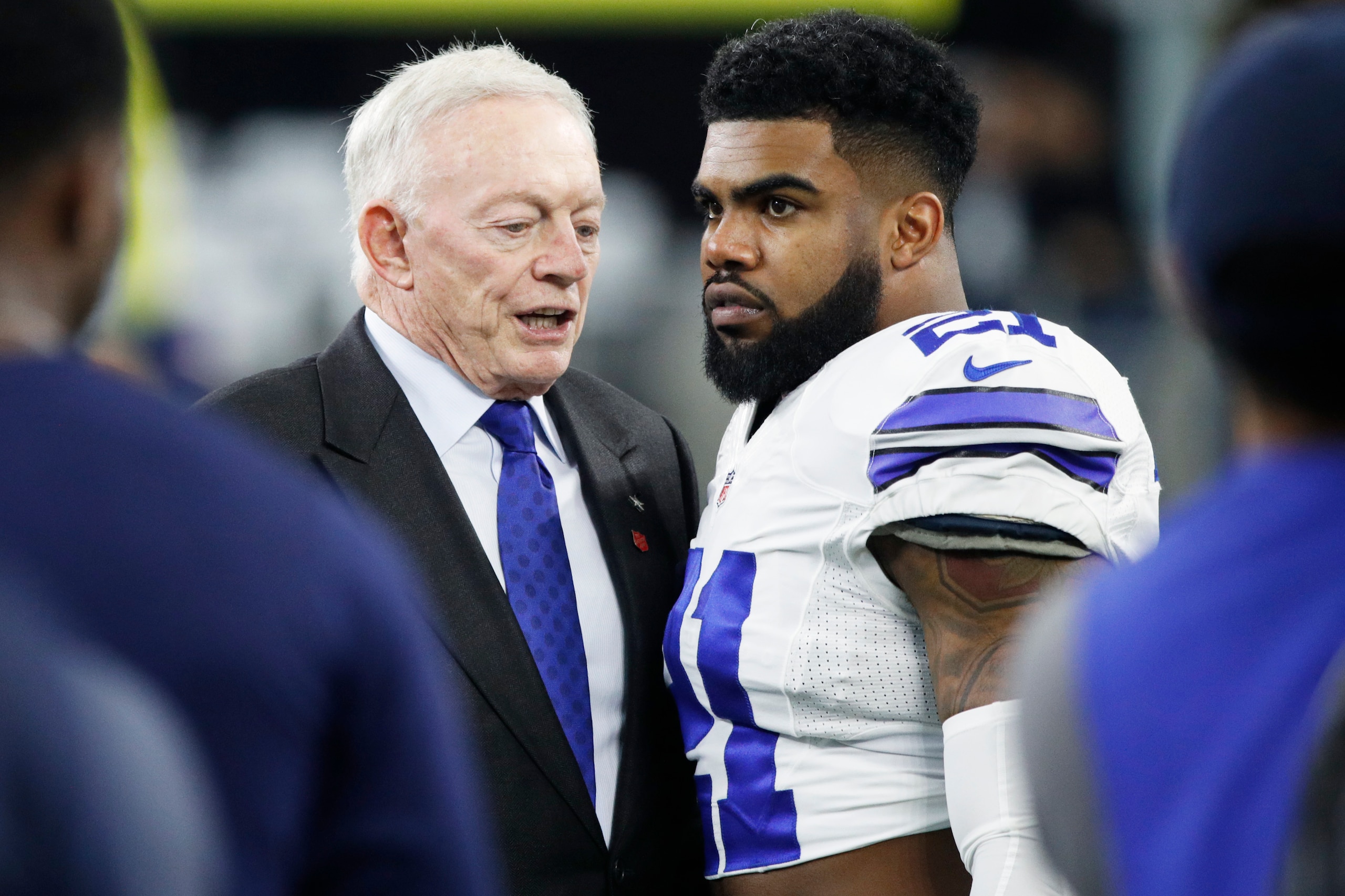 ARLINGTON, TX - JANUARY 15: Ezekiel Elliott #21 of the Dallas Cowboys talks with owner Jerry Jones prior to the NFC Divisional Playoff game against the Green Bay Packers at AT&T Stadium on January 15, 2017 in Arlington, Texas. The Packers defeated the Cow