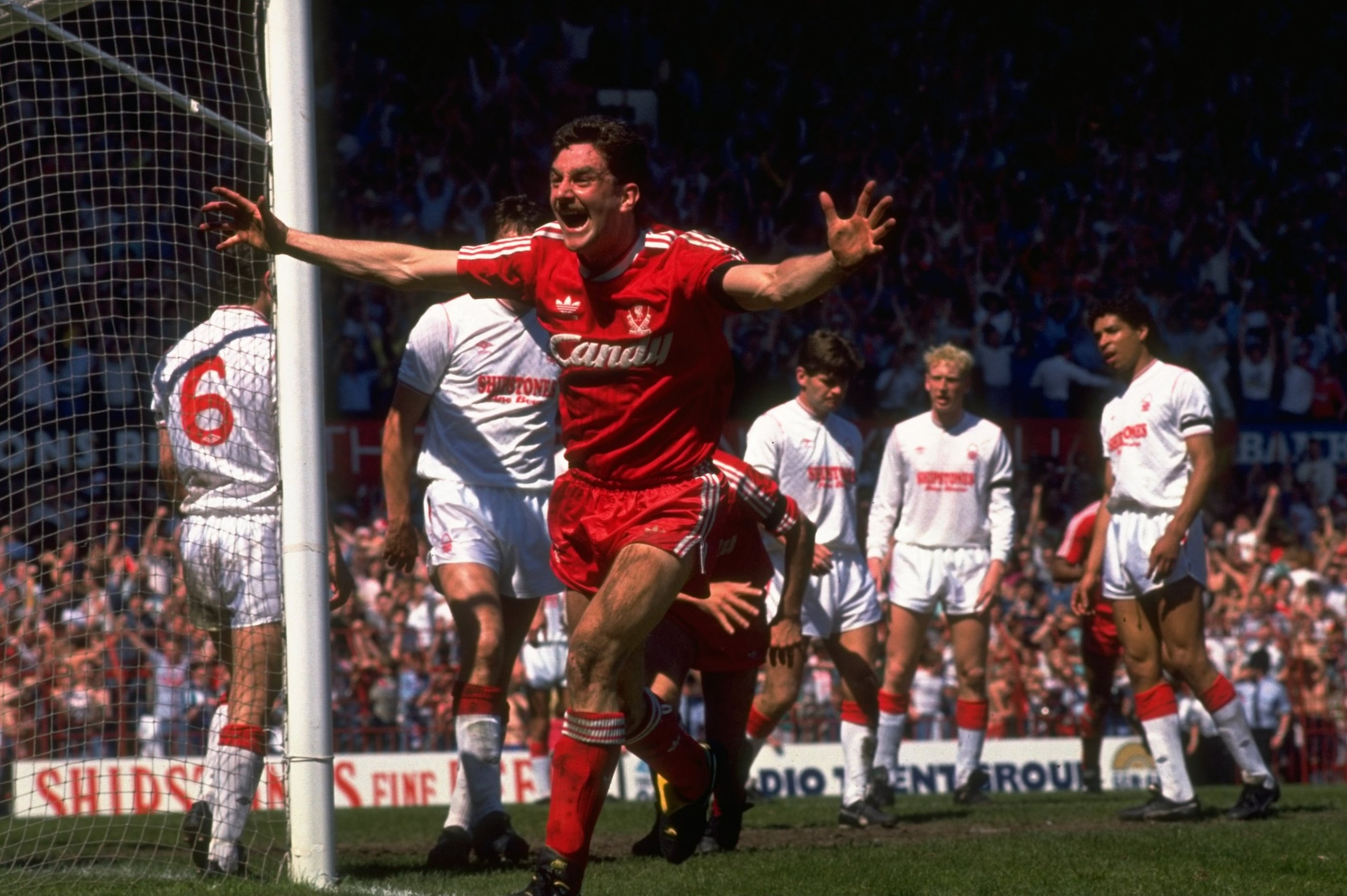 1989:  John Aldridge (front) of Liverpool celebrates his second goal during the FA Cup Semi-Final against Nottingham Forest at Old Trafford in Manchester, England.. Liverpool won the match 3-1. \ Mandatory Credit: Allsport UK /Allsport
