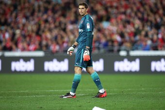 SYDNEY, AUSTRALIA - JULY 15:  Arsenal goalkeeper Emiliano Martinez looks at a paper plane that was thrown onto the pitch during the match between the Western Sydney Wanderers and Arsenal FC at ANZ Stadium on July 15, 2017 in Sydney, Australia.  (Photo by 