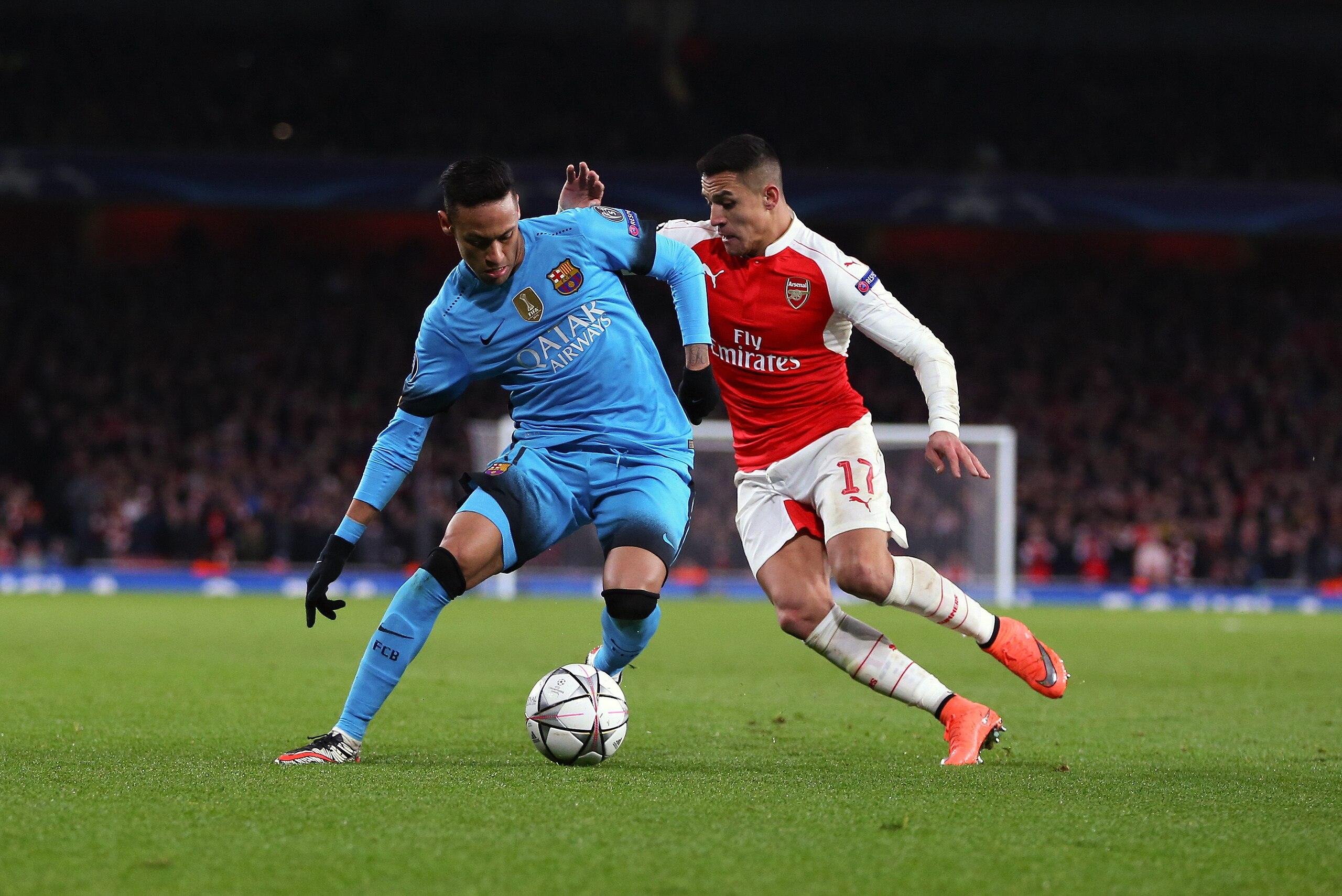 LONDON, ENGLAND - FEBRUARY 23 :  Neymar of FC Barcelona and Alexis Sanchez of Arsenal during the UEFA Champions League match between Arsenal and Barcelona at the Emirates Stadium on February 23, 2016 in London, United Kingdom.  (Photo by Catherine Ivill -