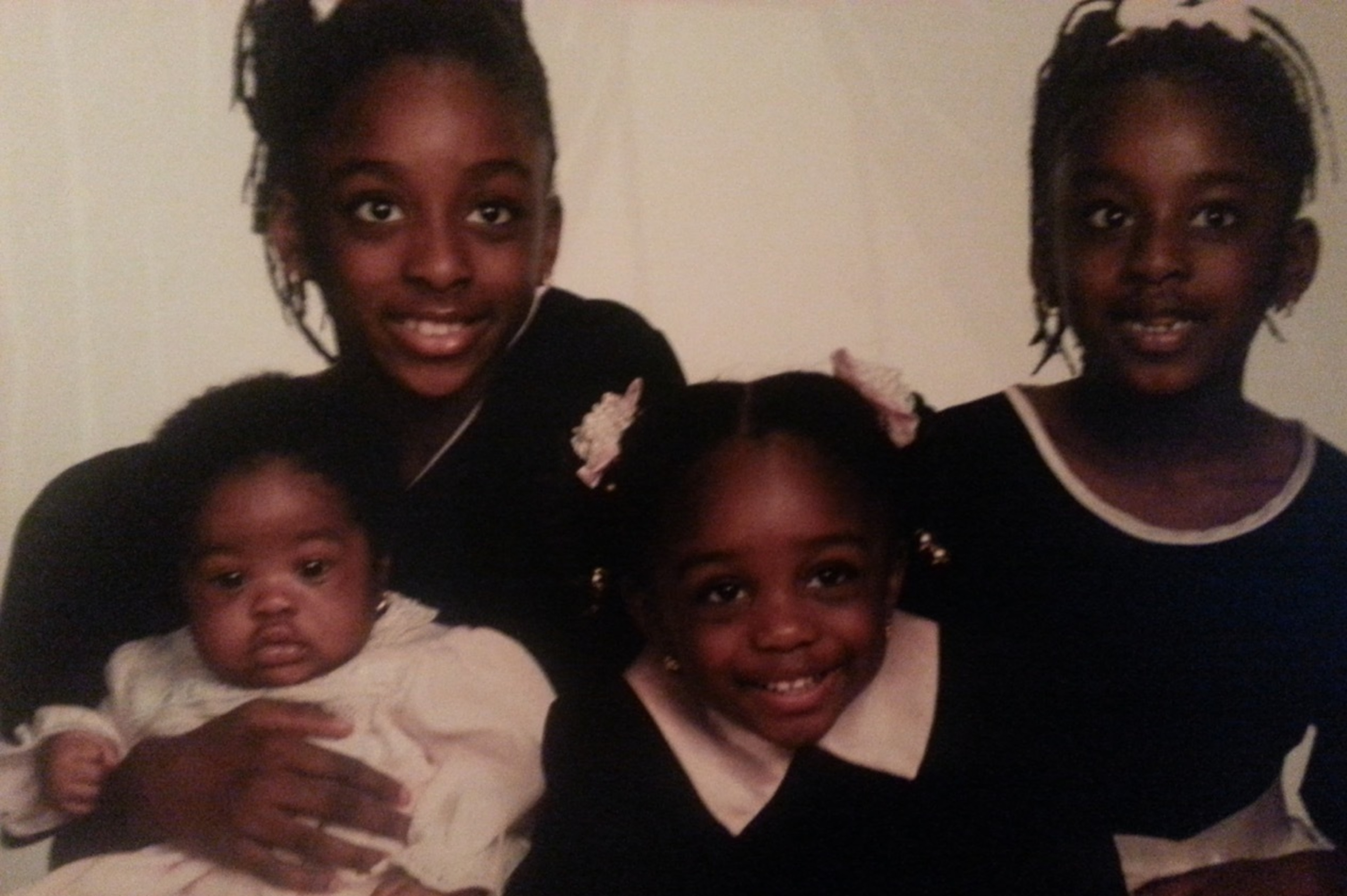 The Ogwumike sisters as children. Clockwise from left: Nneka, Chiney, Olivia and Erica.