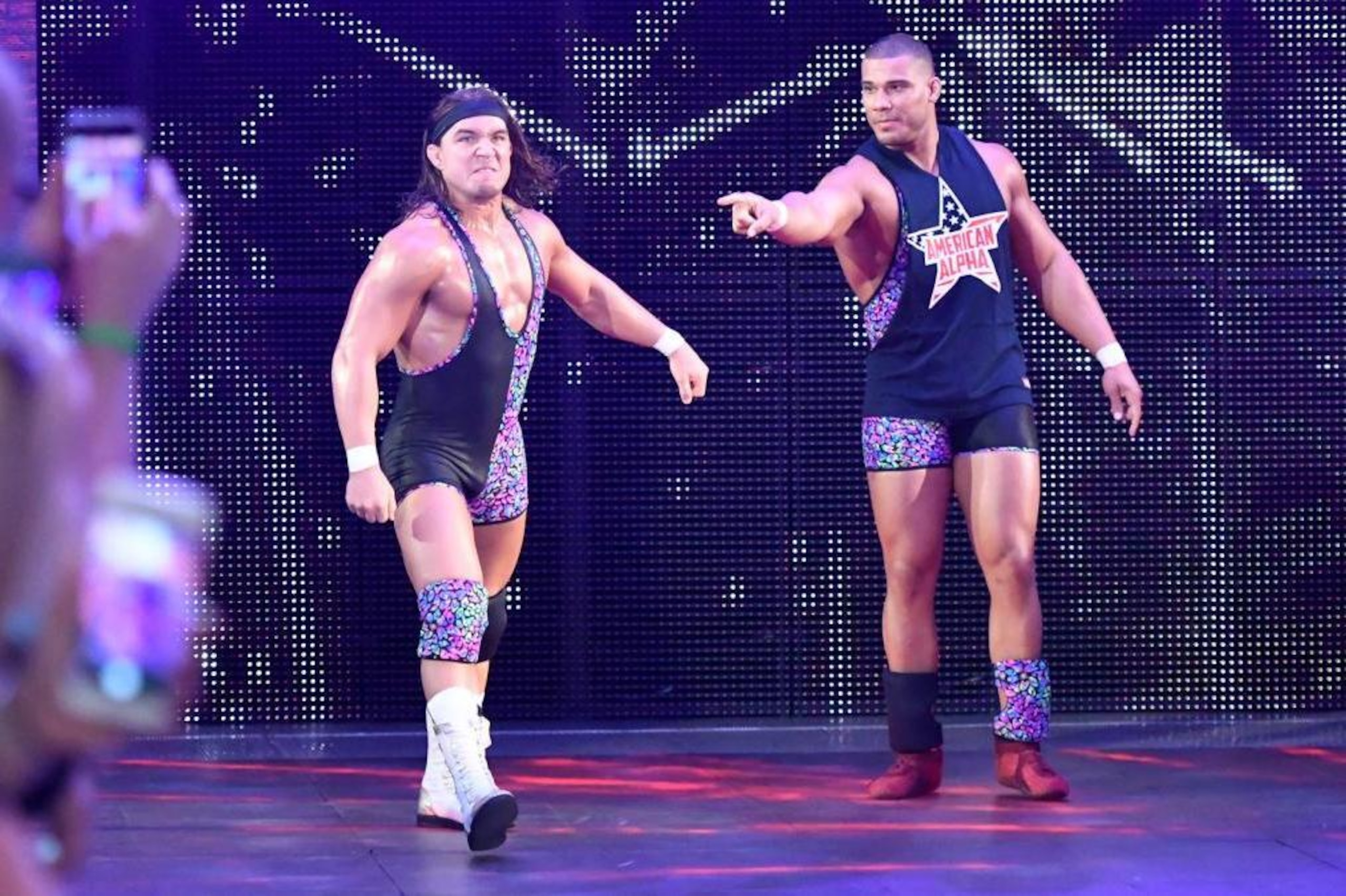 Chad Gable heads to the ring with Jason Jordan at his side.