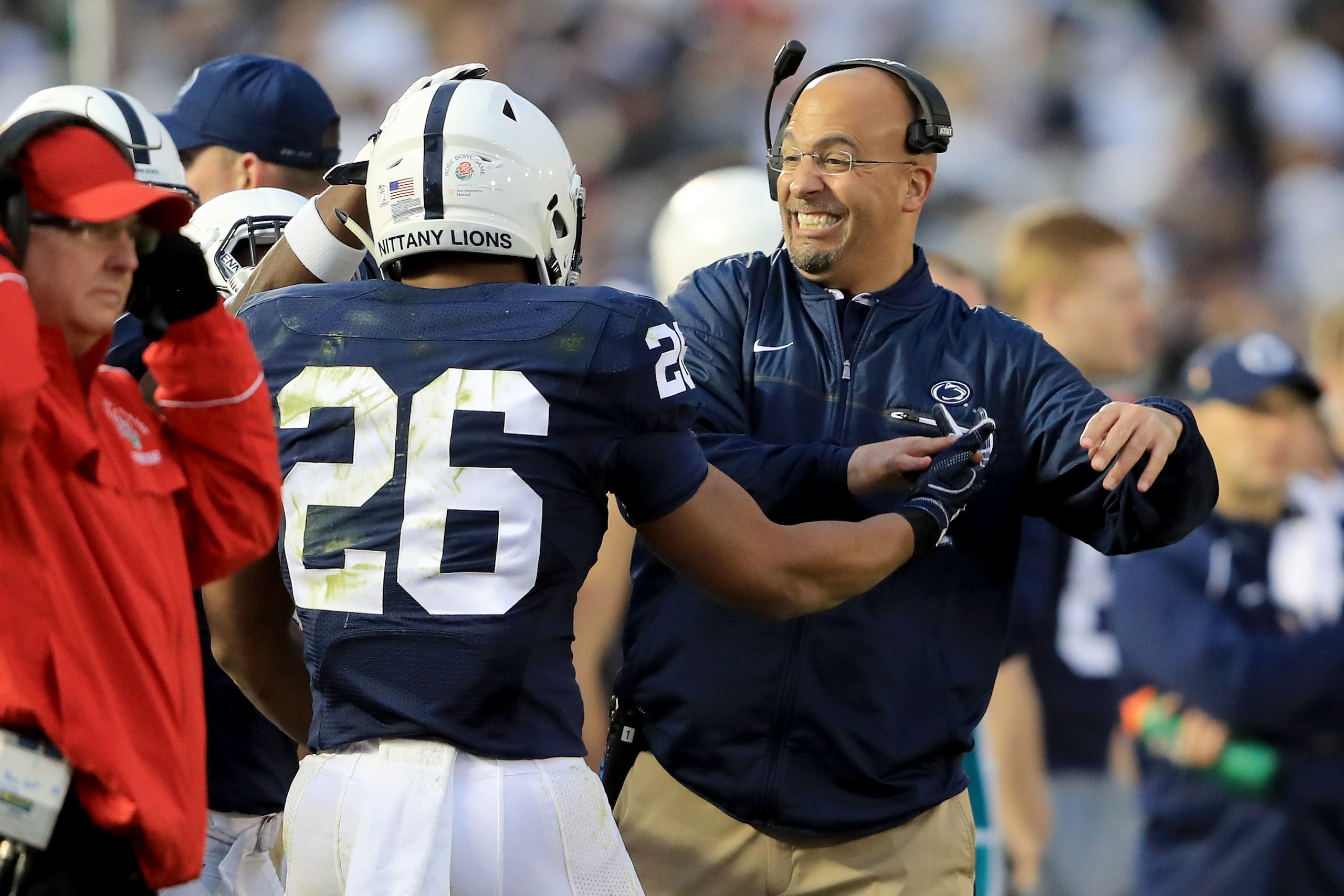 PASADENA, CA - JANUARY 02:  Penn State Nittany Lions head coach James Franklin reacts with running back Saquon Barkley #26 on the sideline during the second half against the USC Trojans during the 2017 Rose Bowl Game presented by Northwestern Mutual at th