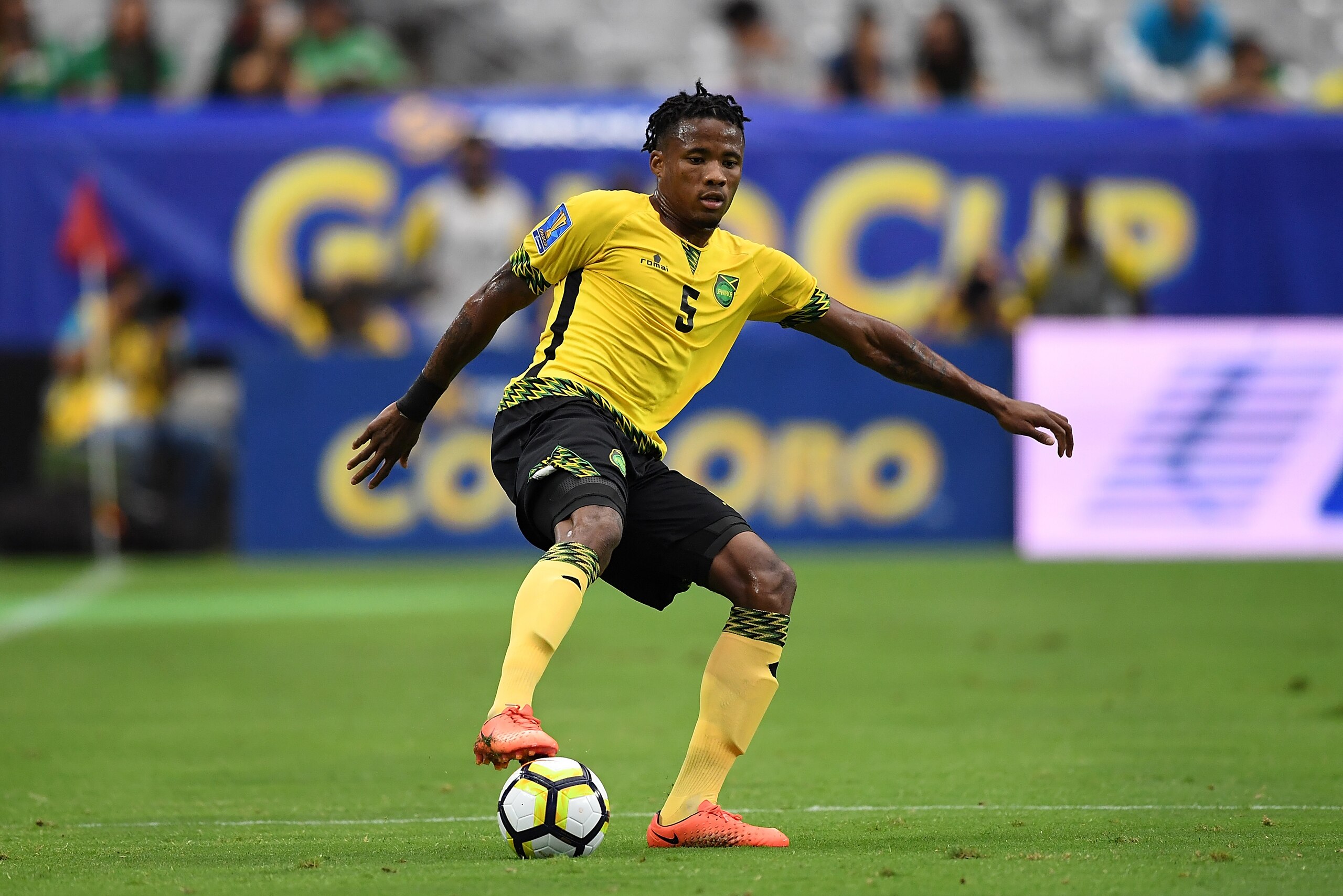 GLENDALE, AZ - JULY 20:  Alvas Powell #5 of Jamaica controls the ball against Canada in a quarterfinal match during the CONCACAF Gold Cup at University of Phoenix Stadium on July 20, 2017 in Glendale, Arizona.  (Photo by Norm Hall/Getty Images)