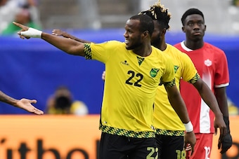 GLENDALE, AZ - JULY 20:  Romario Williams #22 of Jamaica gestures to the crowd after a goal against Canada in a quarterfinal match during the CONCACAF Gold Cup at University of Phoenix Stadium on July 20, 2017 in Glendale, Arizona.  (Photo by Norm Hall/Ge