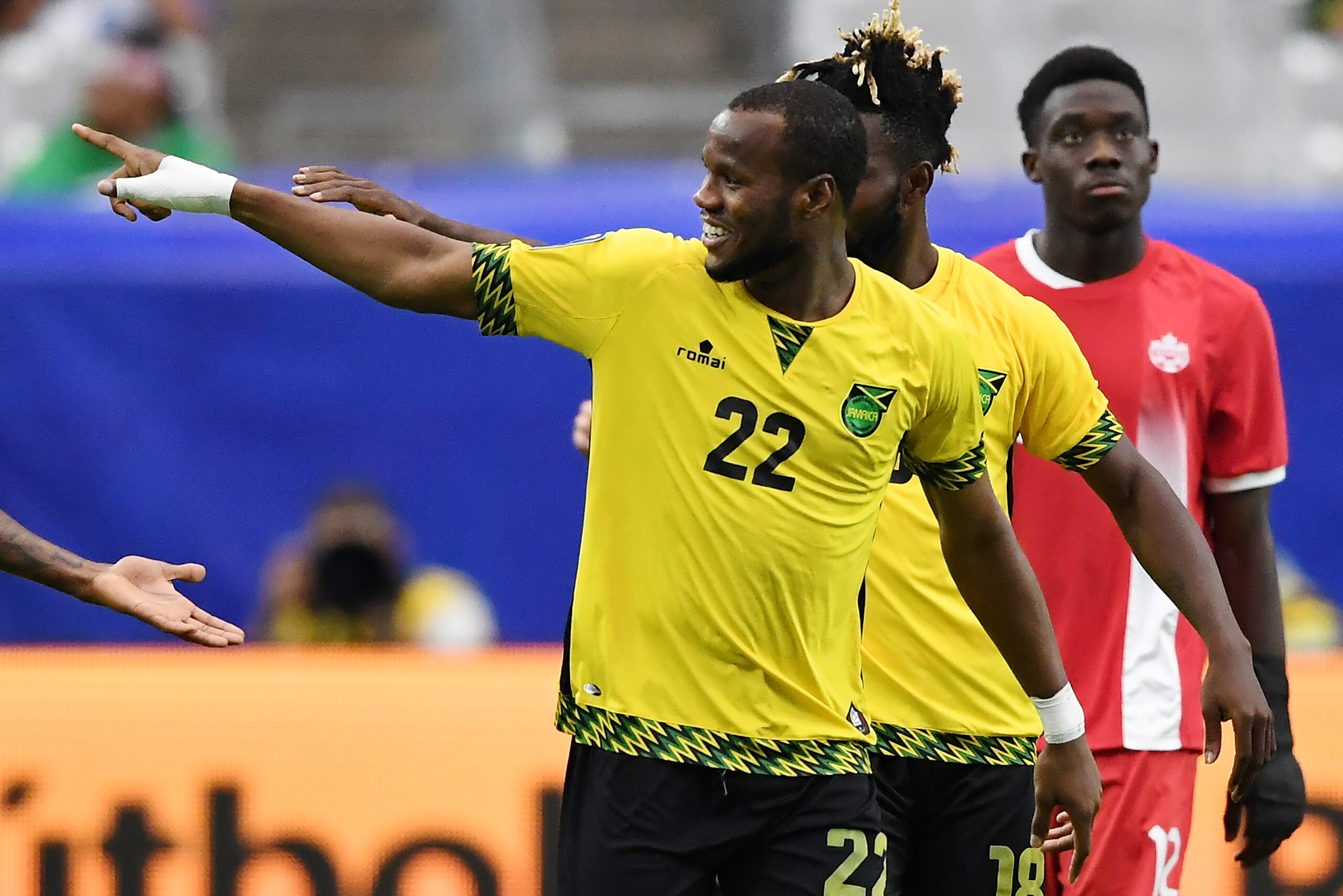 GLENDALE, AZ - JULY 20:  Romario Williams #22 of Jamaica gestures to the crowd after a goal against Canada in a quarterfinal match during the CONCACAF Gold Cup at University of Phoenix Stadium on July 20, 2017 in Glendale, Arizona.  (Photo by Norm Hall/Ge