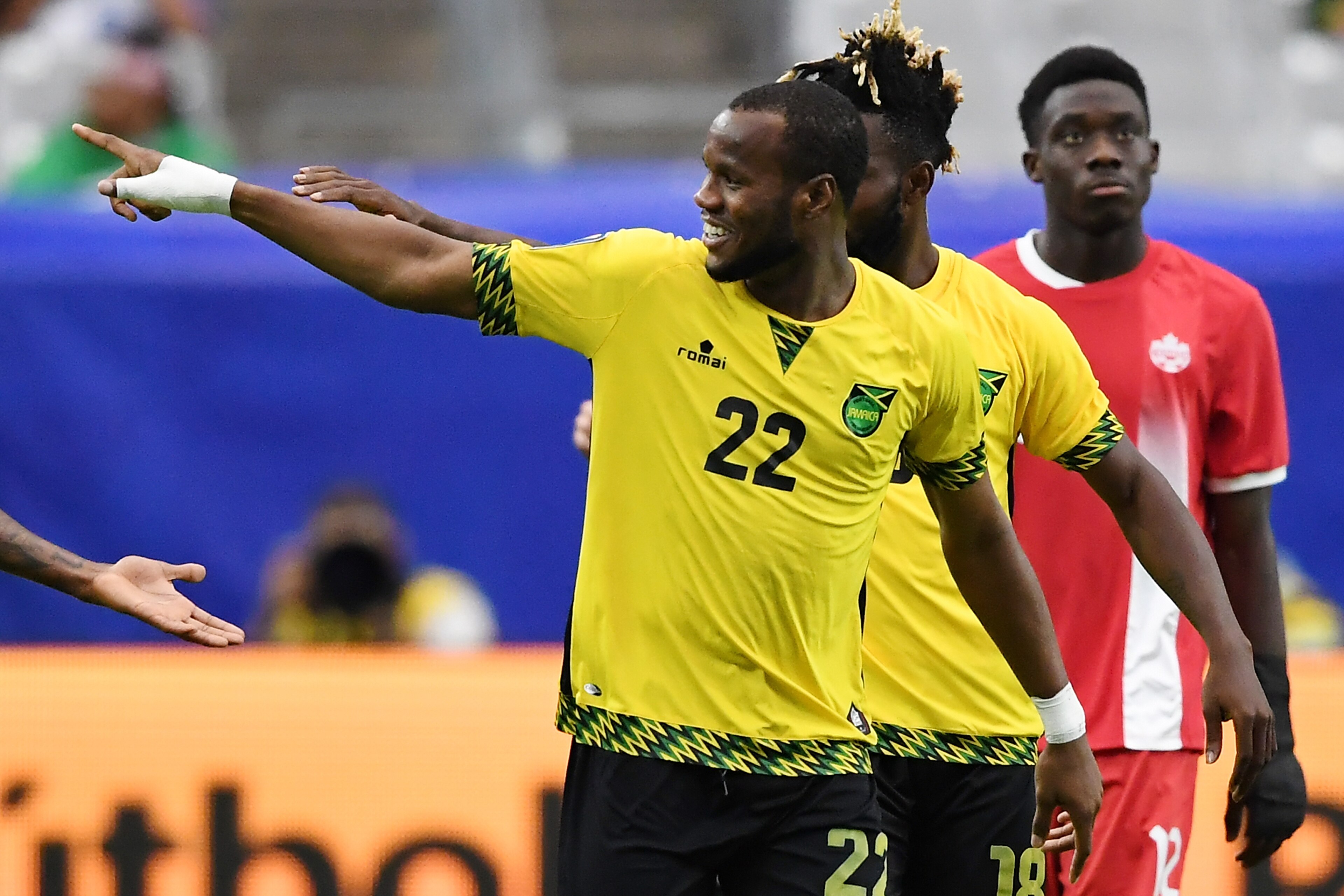 GLENDALE, AZ - JULY 20:  Romario Williams #22 of Jamaica gestures to the crowd after a goal against Canada in a quarterfinal match during the CONCACAF Gold Cup at University of Phoenix Stadium on July 20, 2017 in Glendale, Arizona.  (Photo by Norm Hall/Ge