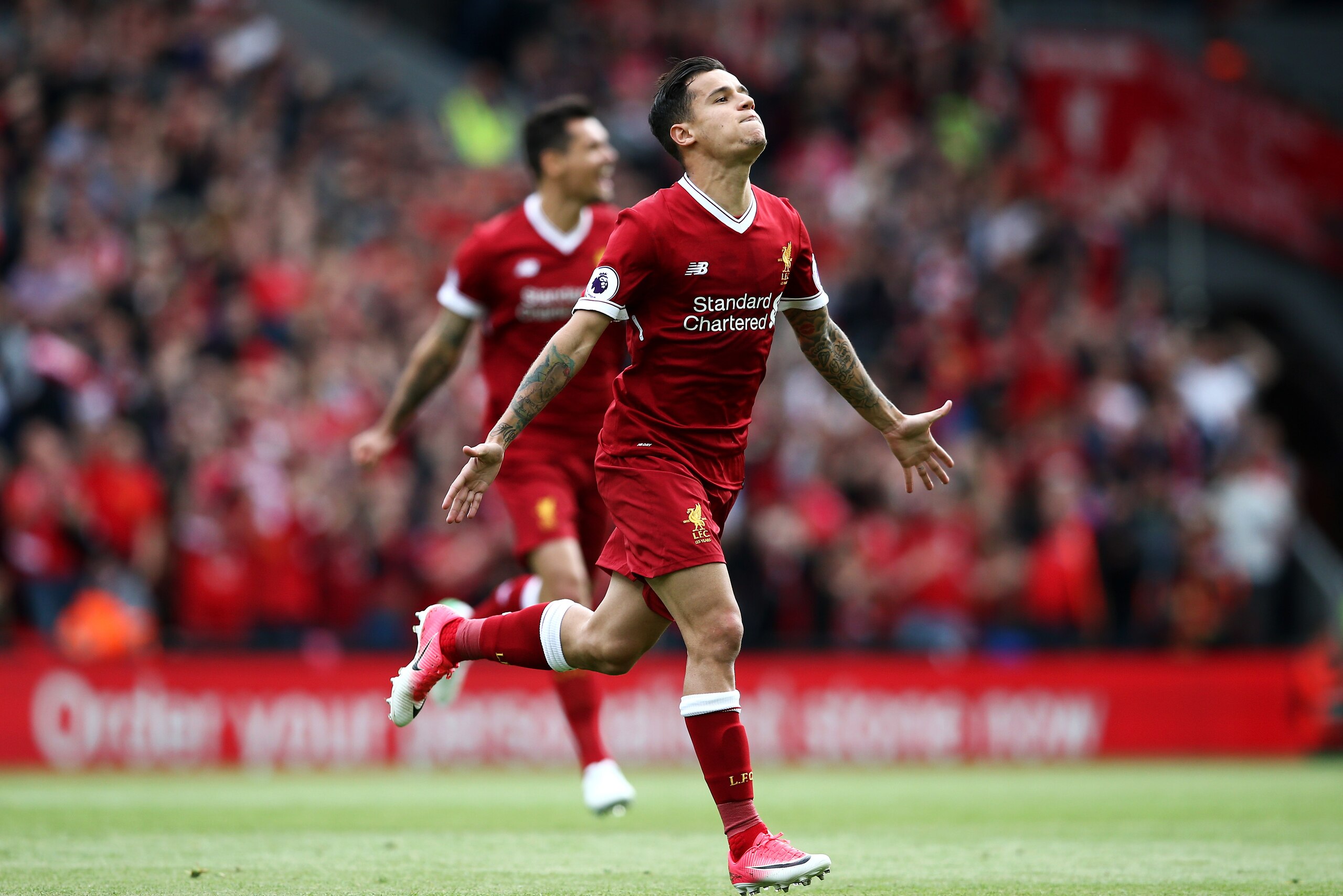 LIVERPOOL, ENGLAND - MAY 21:  Philippe Coutinho of Liverpool celebrates scoring his sides second goal during the Premier League match between Liverpool and Middlesbrough at Anfield on May 21, 2017 in Liverpool, England.  (Photo by Jan Kruger/Getty Images)