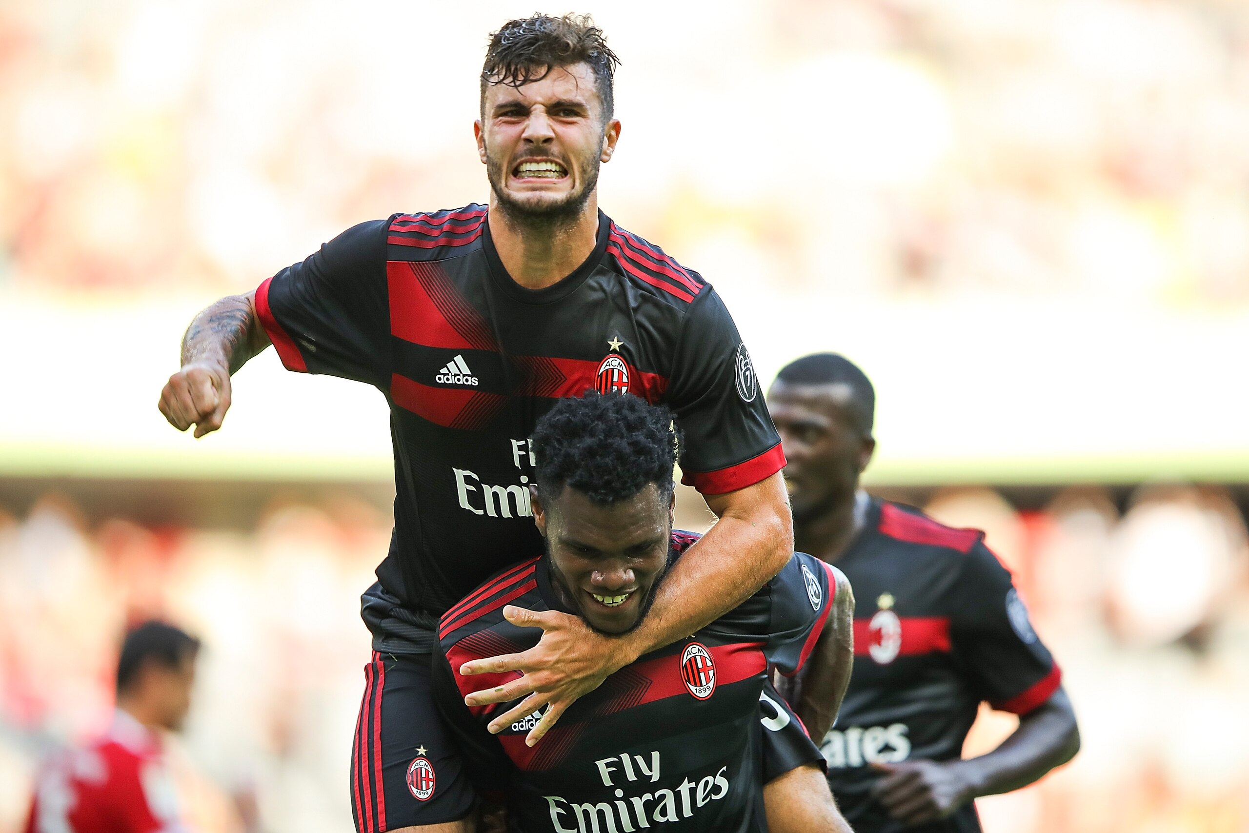 SHENZHEN, CHINA - JULY 22:  Frank Kessie celebrates a goal with teammate Patrick Cutrone during the 2017 International Champions Cup China  match between FC Bayern and AC Milan at Universiade Sports Centre Stadium on July 22, 2017 in Shenzhen, China.  (Ph