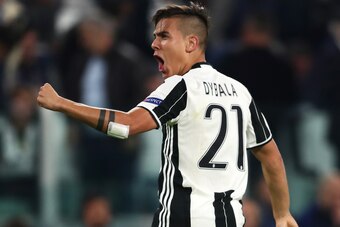 TURIN, ITALY - APRIL 11:  Paulo Dybala of Juventus celebrates scoring the second goal to make the score 2-0  during the UEFA Champions League Quarter Final first leg match between Juventus and FC Barcelona at Juventus Stadium on April 11, 2017 in Turin, I