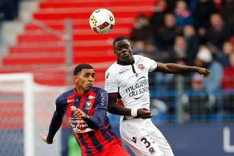 Caen's French forward Sylvio Ronny Rodelin vies for the ball with Nice's French defender Malang Sarr during Caen (SM Caen) and Nice (OGC Nice), on November 6, 2016, at the Michel d'Ornano stadium, in Caen, northwestern France. / AFP / CHARLY TRIBALLEAU   