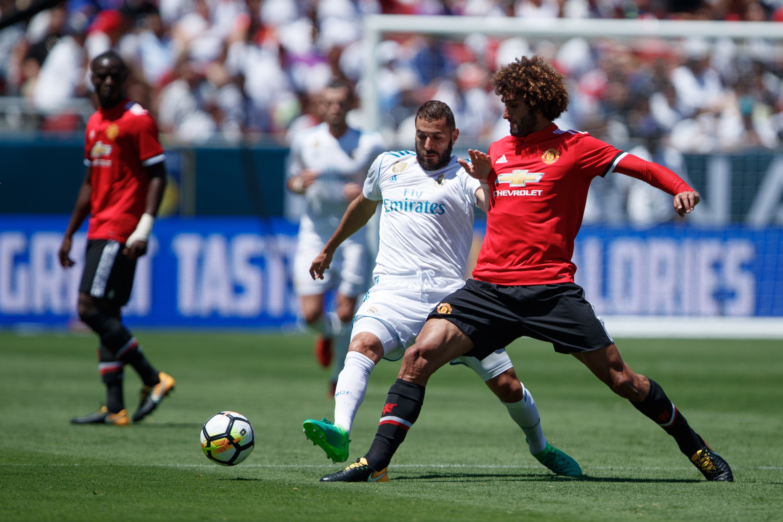 SANTA CLARA, CA - JULY 23: Karim Benzema of Real Madrid and Marouane Fellaini of Manchester United during the International Champions Cup 2017 match between Real Madrid v Manchester United at Levi'a Stadium on July 23, 2017 in Santa Clara, California. (Ph