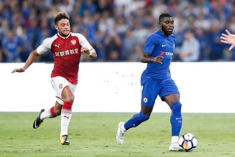 BEIJING, CHINA - JULY 22: Alex Oxlade-Chamberlain of Arsenal and Jeremie Boga of Chelsea react during the Pre-Season Friendly match between Arsenal FC and Chelsea FC at Birds Nest on July 22, 2017 in Beijing, China.  (Photo by Yifan Ding/Getty Images )
