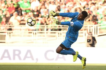 Goalkeeper Andre Blake (#1) of Jamaica makes a save against  Mexico during the CONCACAF Gold Cup semifinal match on July 23, 2017 at The Rose Bowl in Pasadena, California. / AFP PHOTO / Robyn Beck        (Photo credit should read ROBYN BECK/AFP/Getty Imag