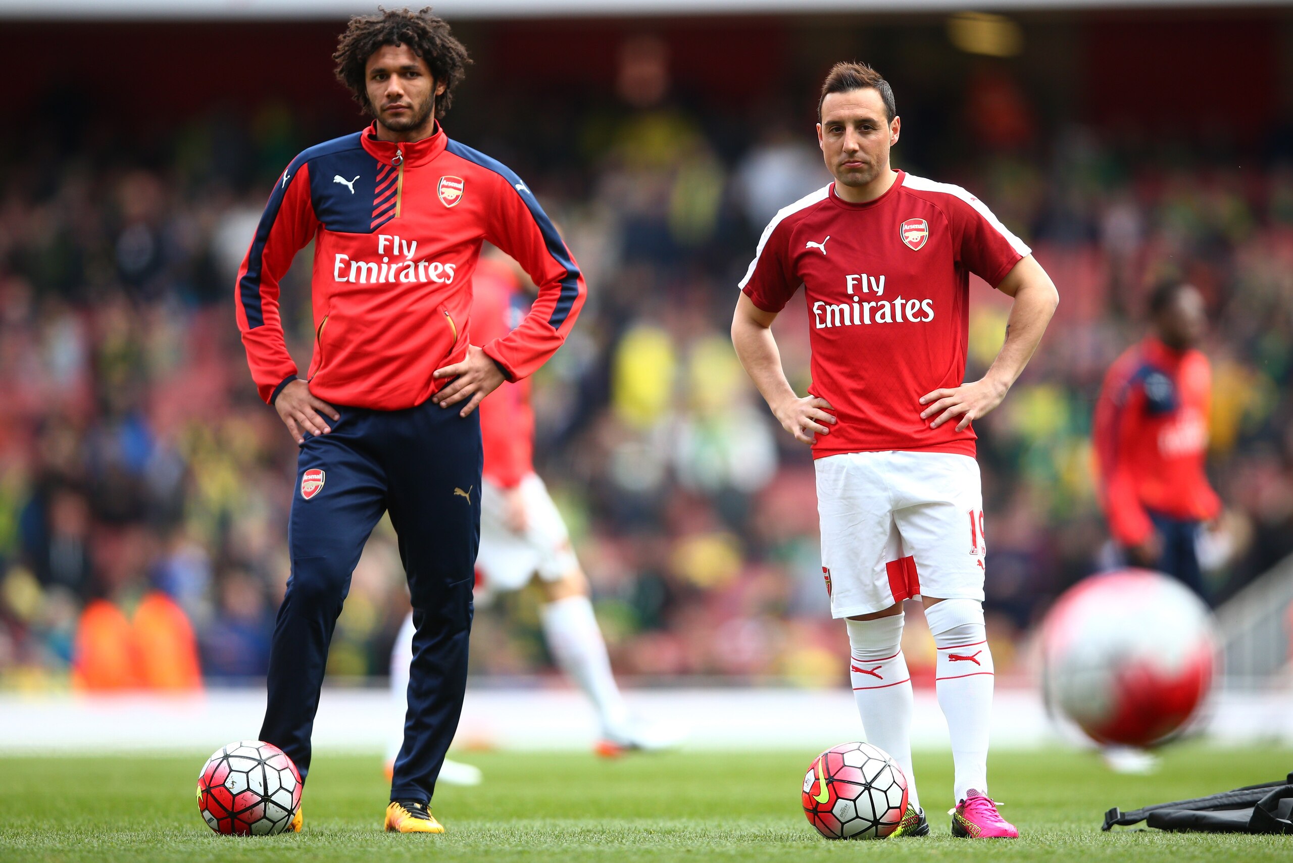 LONDON, ENGLAND - APRIL 30:  Mohamed Elneny (L) and Santi Cazorla of Arsenal are seen during the warm up prior to the Barclays Premier League match between Arsenal and Norwich City at The Emirates Stadium on April 30, 2016 in London, England  (Photo by Pa