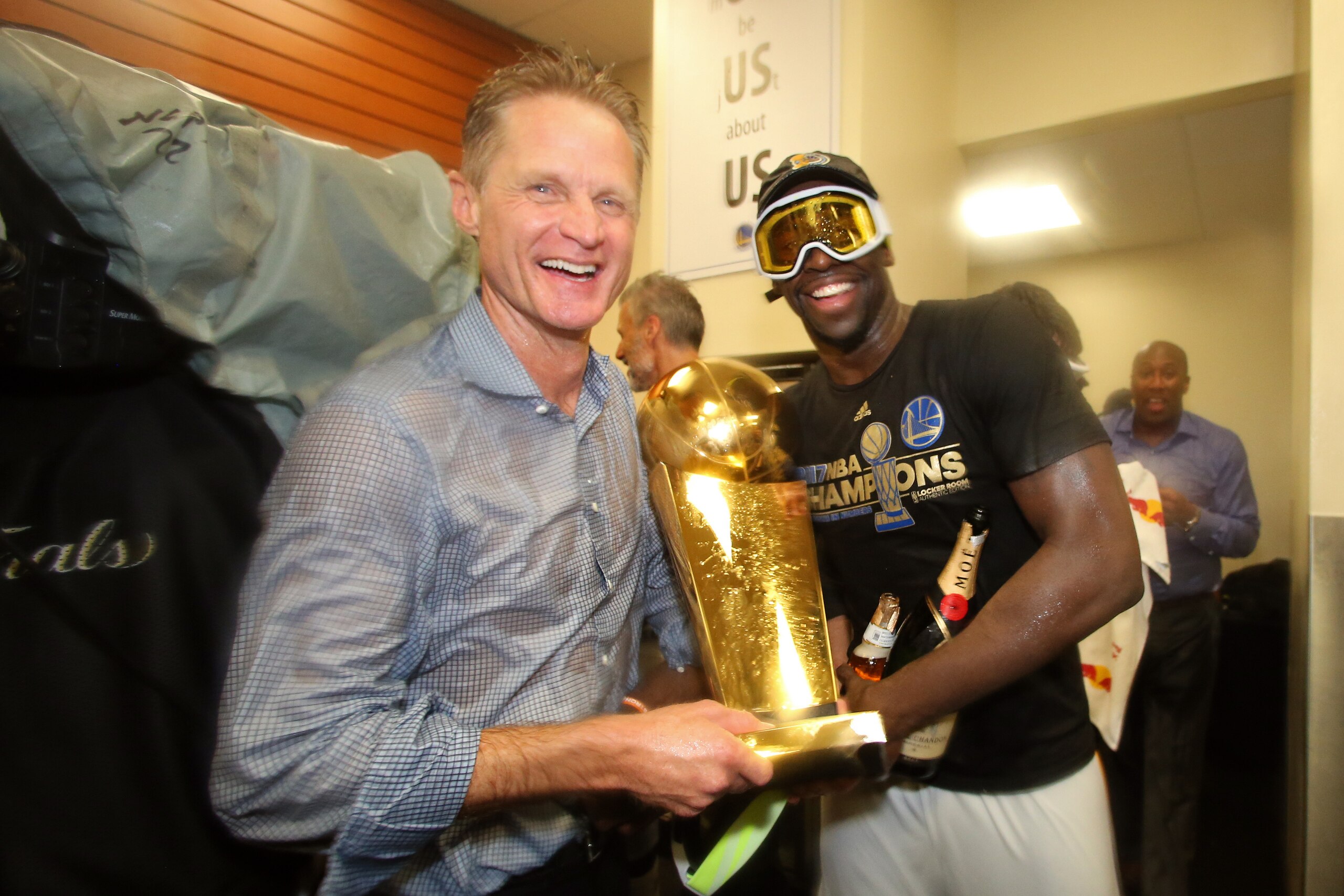OAKLAND, CA - JUNE 12: Steve Kerr and Draymond Green #23 of the Golden State Warriors celebrate with the Larry O'Brien Trophy in the locker room after winning the NBA Championsip in Game Five of the 2017 NBA Finals against the Cleveland Cavaliers on June OAKLAND, CA - JUNE 12: Steve Kerr and Draymond Green #23 of the Golden State Warriors celebrate with the Larry O'Brien Trophy in the locker room after winning the NBA Championsip in Game Five of the 2017 NBA Finals against the Cleveland Cavaliers on June