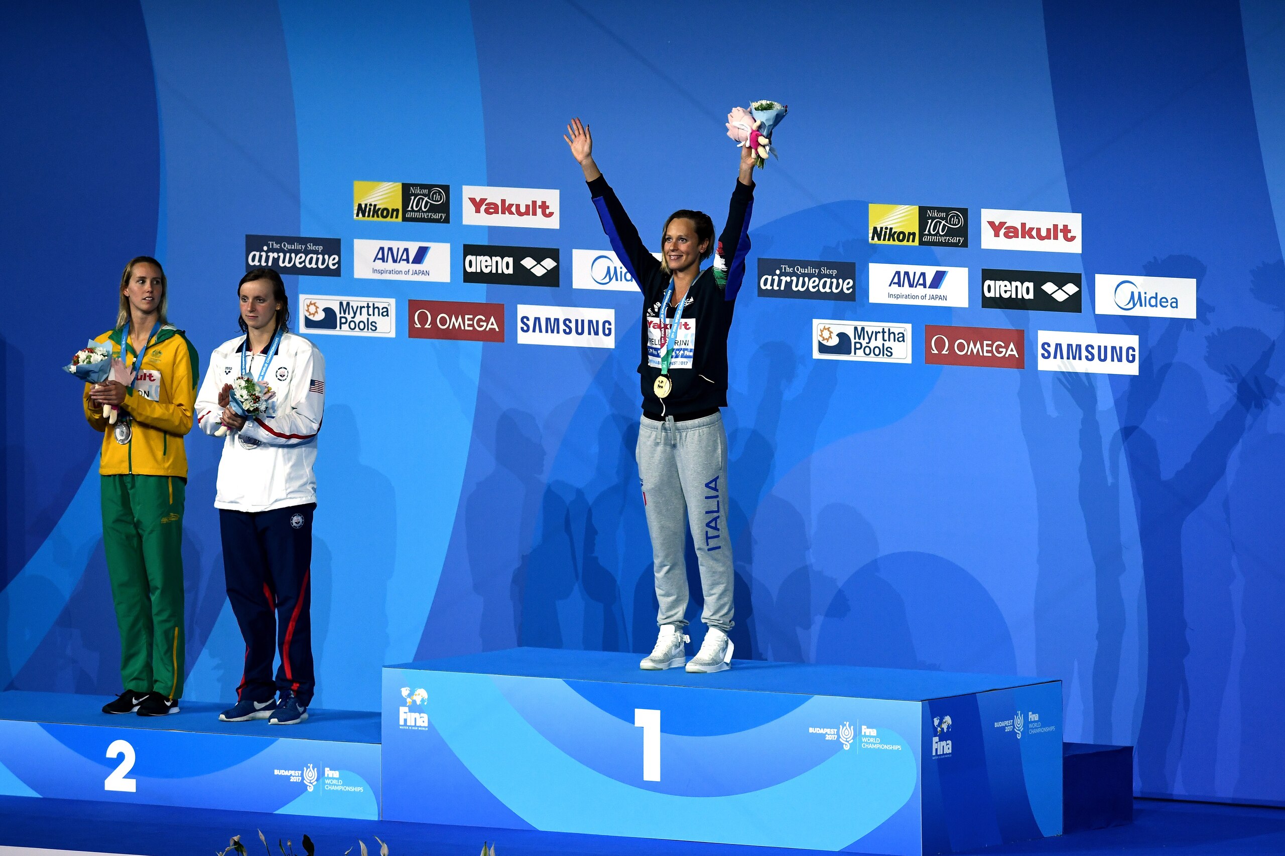 BUDAPEST, HUNGARY - JULY 26: (L-R) Silver medalists Emma Mckeon of Australia and Katie Ledecky of the United States and gold medalist Federica Pellegrini of Italy pose with the medals won during the Women's 200m Freestyle final on day thirteen of the Buda