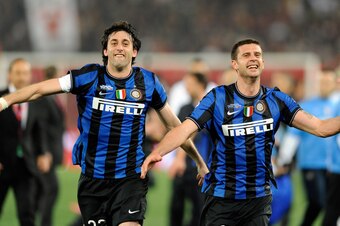 ROME - MAY 05: Diego Milito and Thiago Motta of Inter Milan celebrate after the Tim Cup final between FC Internazionale Milano and AS Roma at Stadio Olimpico on May 5, 2010 in Rome, Italy.  (Photo by Claudio Villa/Getty Images)