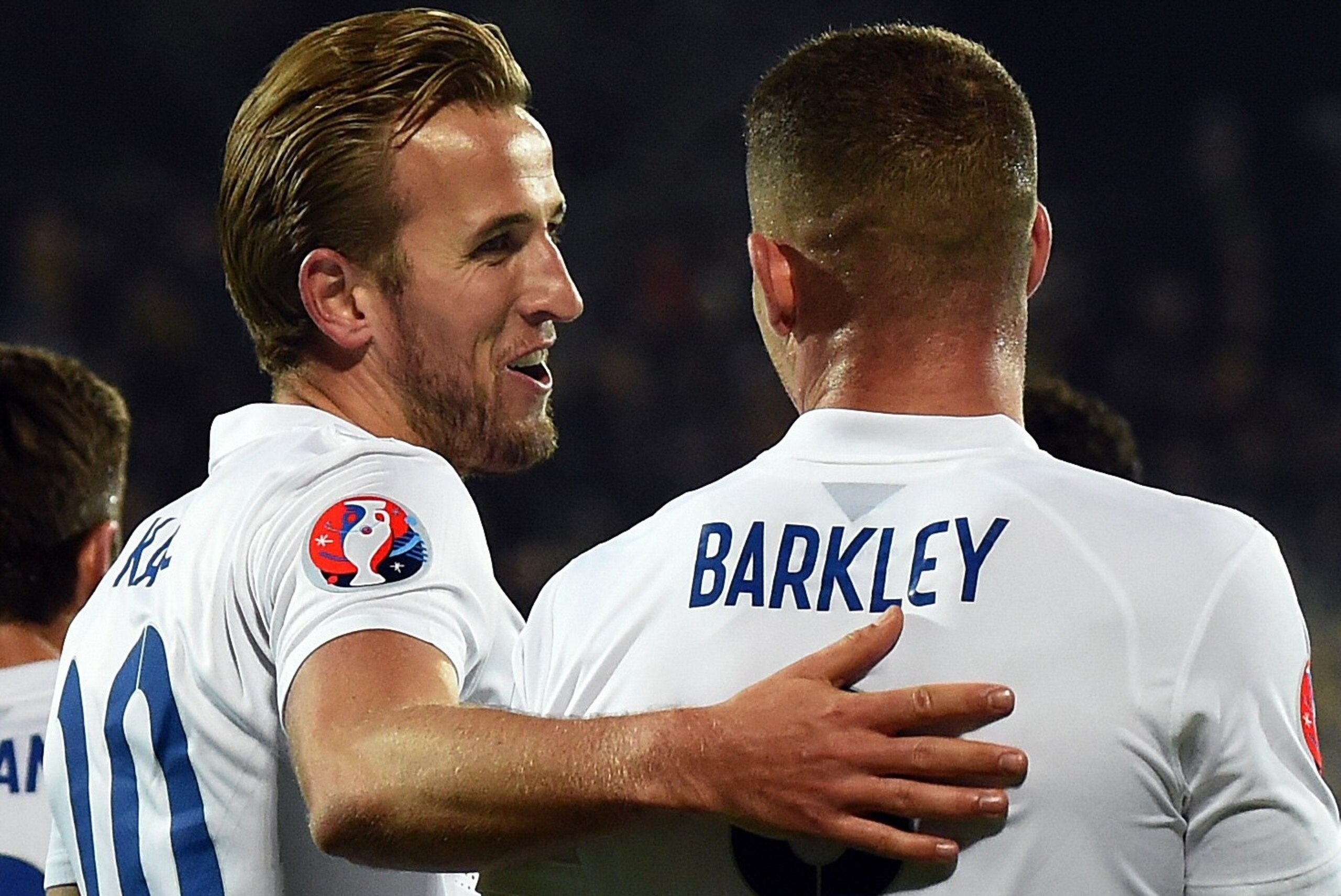 England's Harry Kane reacts after scoring a goal with teammate Ross Barkley during the Euro 2016 Group E qualifying football match between Lithuania and England at LFF stadium in Vilnius on October 12, 2015. AFP PHOTO / JANEK SKARZYNSKI        (Photo cred