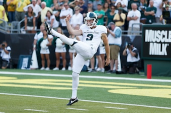 EUGENE, OR - SEPTEMBER 6: Mike Sadler #3 of the Michigan State Spartans punts the ball against the Oregon Ducks during the game at Autzen Stadium on September 6, 2014 in Eugene, Oregon. Oregon won 46-27. (Photo by Joe Robbins/Getty Images)