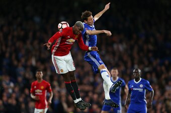 LONDON, ENGLAND - MARCH 13: Paul Pogba of Manchester United and Nemanja Matic of Chelsea during The Emirates FA Cup Quarter-Final match between Chelsea and Manchester United at Stamford Bridge on March 13, 2017 in London, England. (Photo by Catherine Ivil