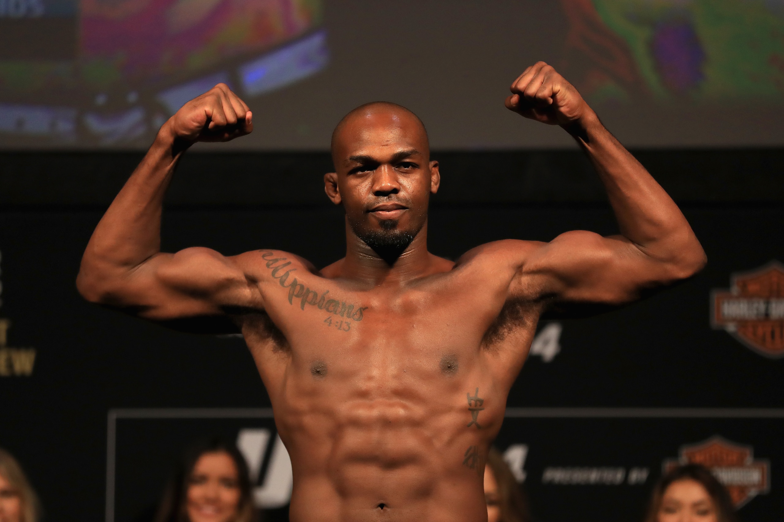 ANAHEIM, CA - JULY 28:  Jon Jones flexes for fans during the UFC 214 weigh-in at Honda Center on July 28, 2017 in Anaheim, California. Jones will fight Daniel Cormier in the light heavyweight title bout on July 28, 2017 in Anaheim, California.(Photo by Se