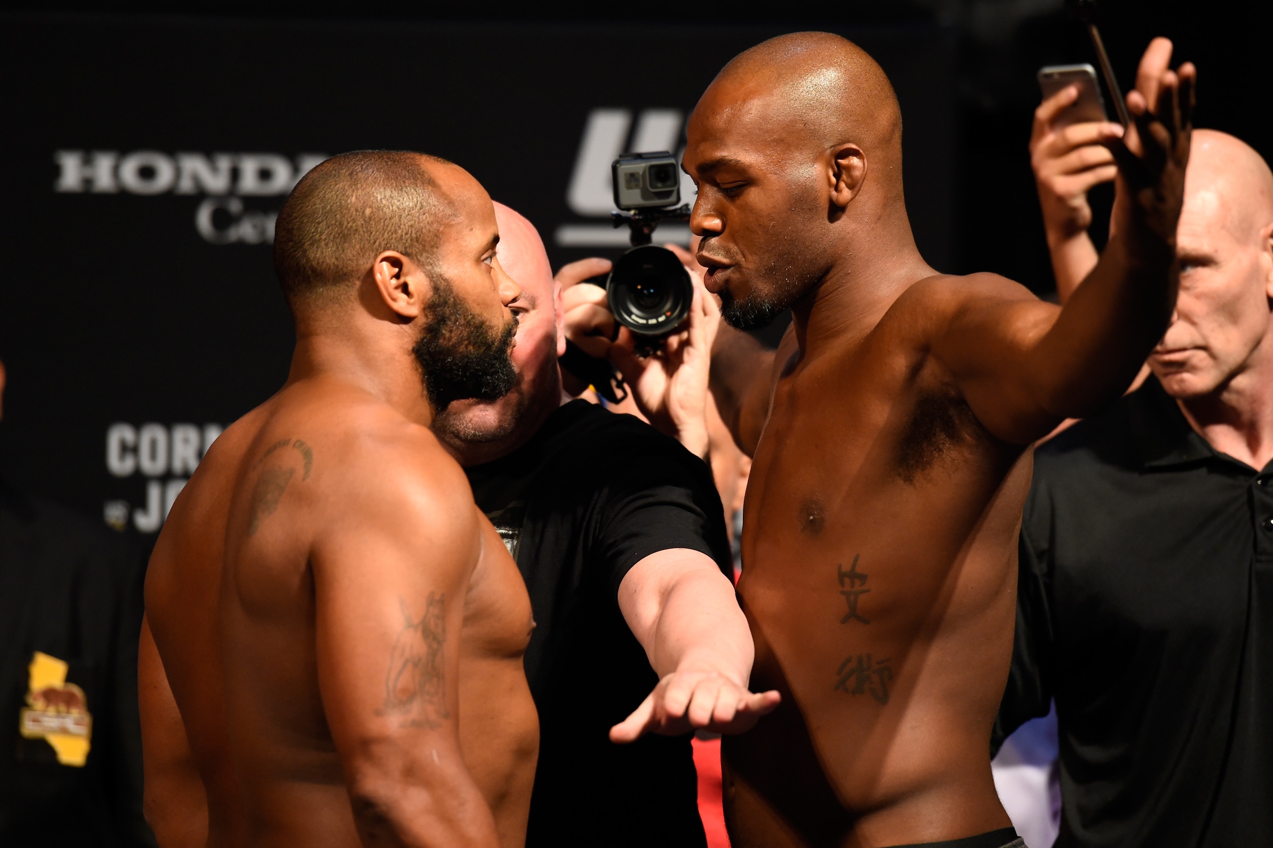 ANAHEIM, CA - JULY 28:   (L-R) Daniel Cormier and Jon Jones face off during the UFC 214 weigh-in inside the Honda Center on July 28, 2017 in Anaheim, California. (Photo by Josh Hedges/Zuffa LLC/Zuffa LLC via Getty Images)