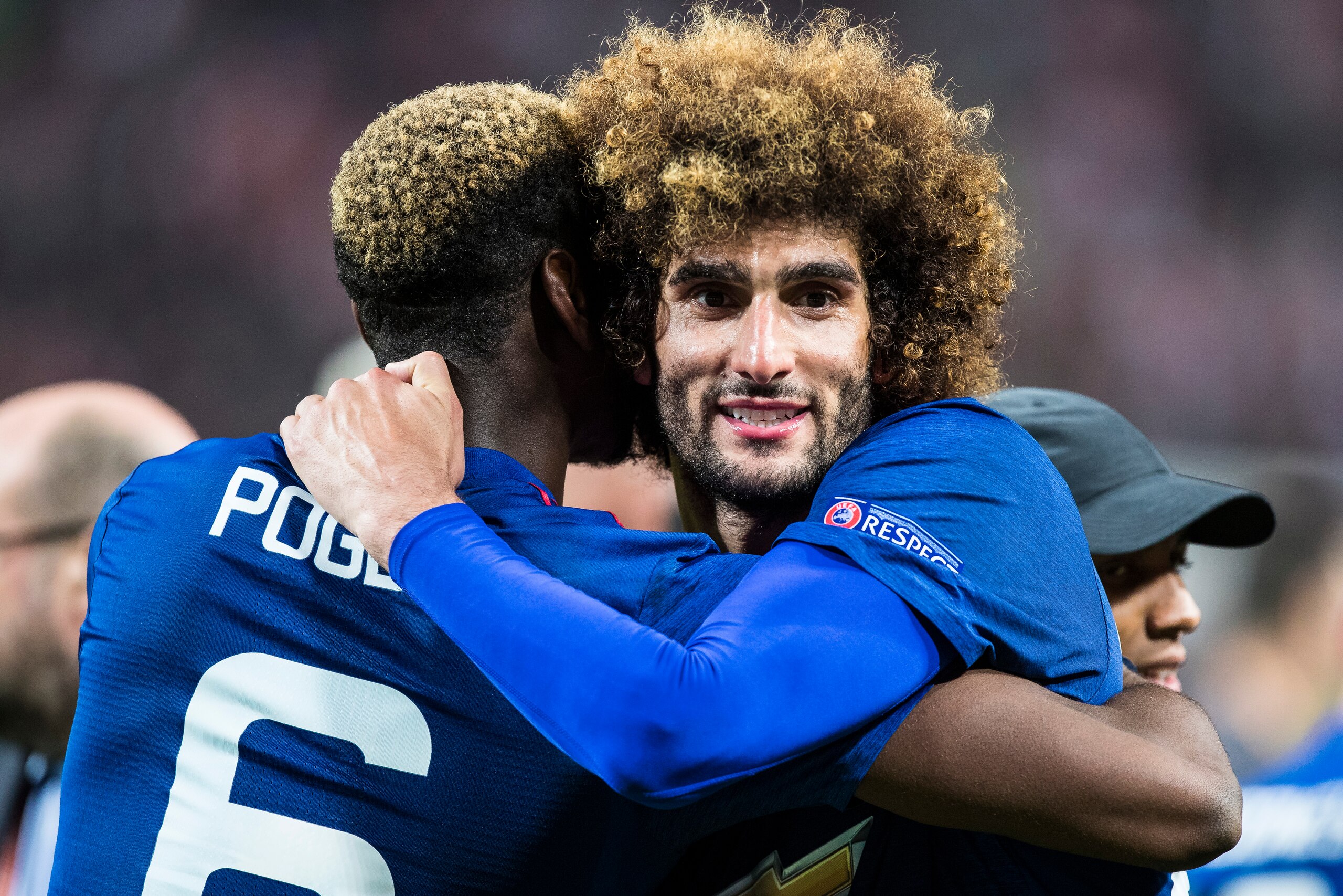STOCKHOLM, SWEDEN - MAY 24: Marouane Fellaini and Paul Pogba of Manchester United embrace after the UEFA Europa League final between Ajax and Manchester United at Friends Arena on May 24, 2017 in Stockholm, Sweden. (Photo by MICHAEL CAMPANELLA/Getty Image