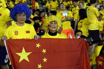 MALACCA, MALAYSIA - JUNE 13: Chinese fans  during the 2018 FIFA World Cup Asian Qualifier Group A Final Round match between Syria and China at Hang Jebat Stadium on June 13, 2017 in Malacca, Malaysia.  (Photo by Stanley Chou/Getty Images)