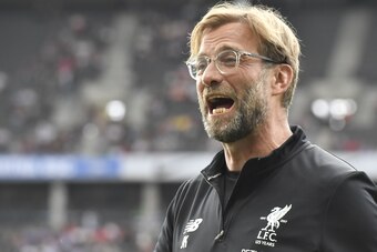 Liverpool's German manager Jurgen Klopp reacts prior the friendly football match Hertha Berlin vs Liverpool in Berlin, Germany, on July 29, 2017.  / AFP PHOTO / John MACDOUGALL        (Photo credit should read JOHN MACDOUGALL/AFP/Getty Images)