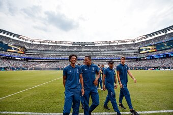 EAST RUTHERFORD, NJ - JULY 22:  Juan Cuadrado and Alex Sandro of Juventus during the pitch inspection before the International Champions Cup match between Juventus and Barcelona at MetLife Stadium on July 22, 2017 in East Rutherford, New Jersey.  (Photo b