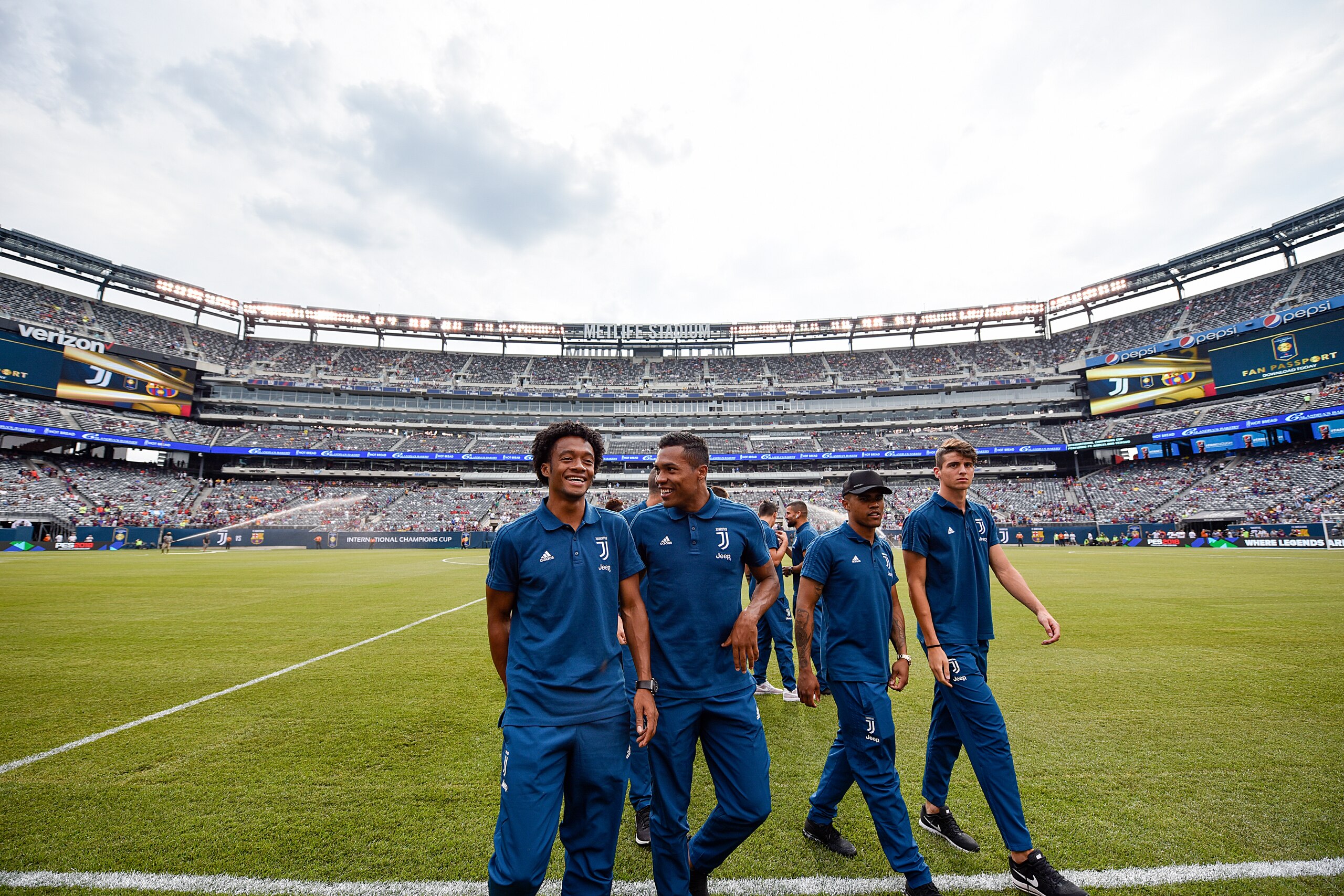 EAST RUTHERFORD, NJ - JULY 22:  Juan Cuadrado and Alex Sandro of Juventus during the pitch inspection before the International Champions Cup match between Juventus and Barcelona at MetLife Stadium on July 22, 2017 in East Rutherford, New Jersey.  (Photo b