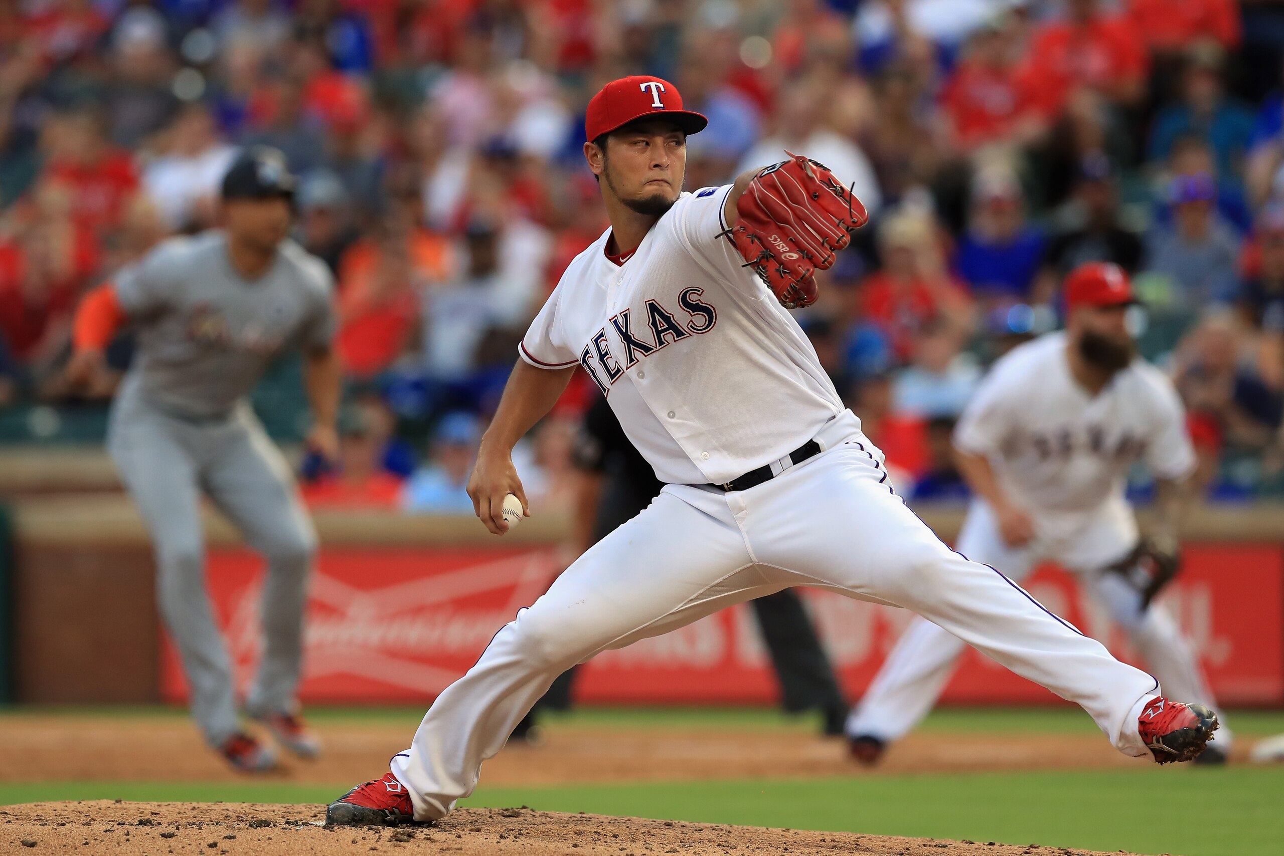 ARLINGTON, TX - JULY 26: Yu Darvish #11 of the Texas Rangers throws against the Miami Marlins in the fourth inning at Globe Life Park in Arlington on July 26, 2017 in Arlington, Texas. (Photo by Ronald Martinez/Getty Images) ARLINGTON, TX - JULY 26: Yu Darvish #11 of the Texas Rangers throws against the Miami Marlins in the fourth inning at Globe Life Park in Arlington on July 26, 2017 in Arlington, Texas. (Photo by Ronald Martinez/Getty Images)